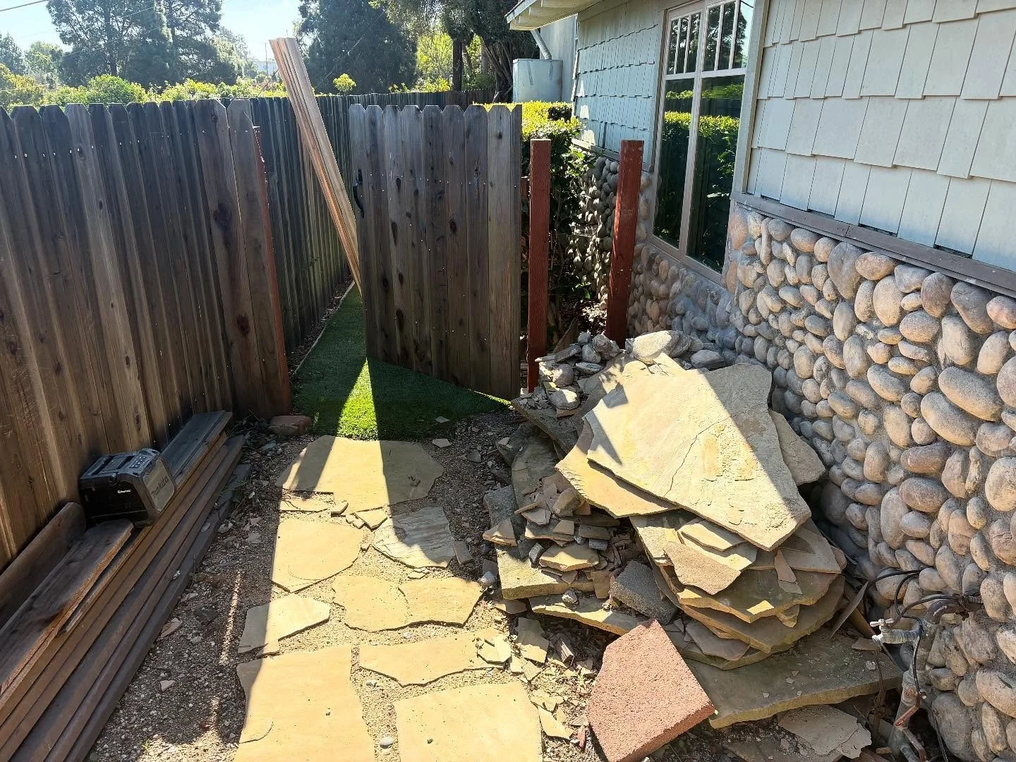 GATE REPAIRED &amp; GATE LOCATION MOVED. STONE PATH LAID OUT