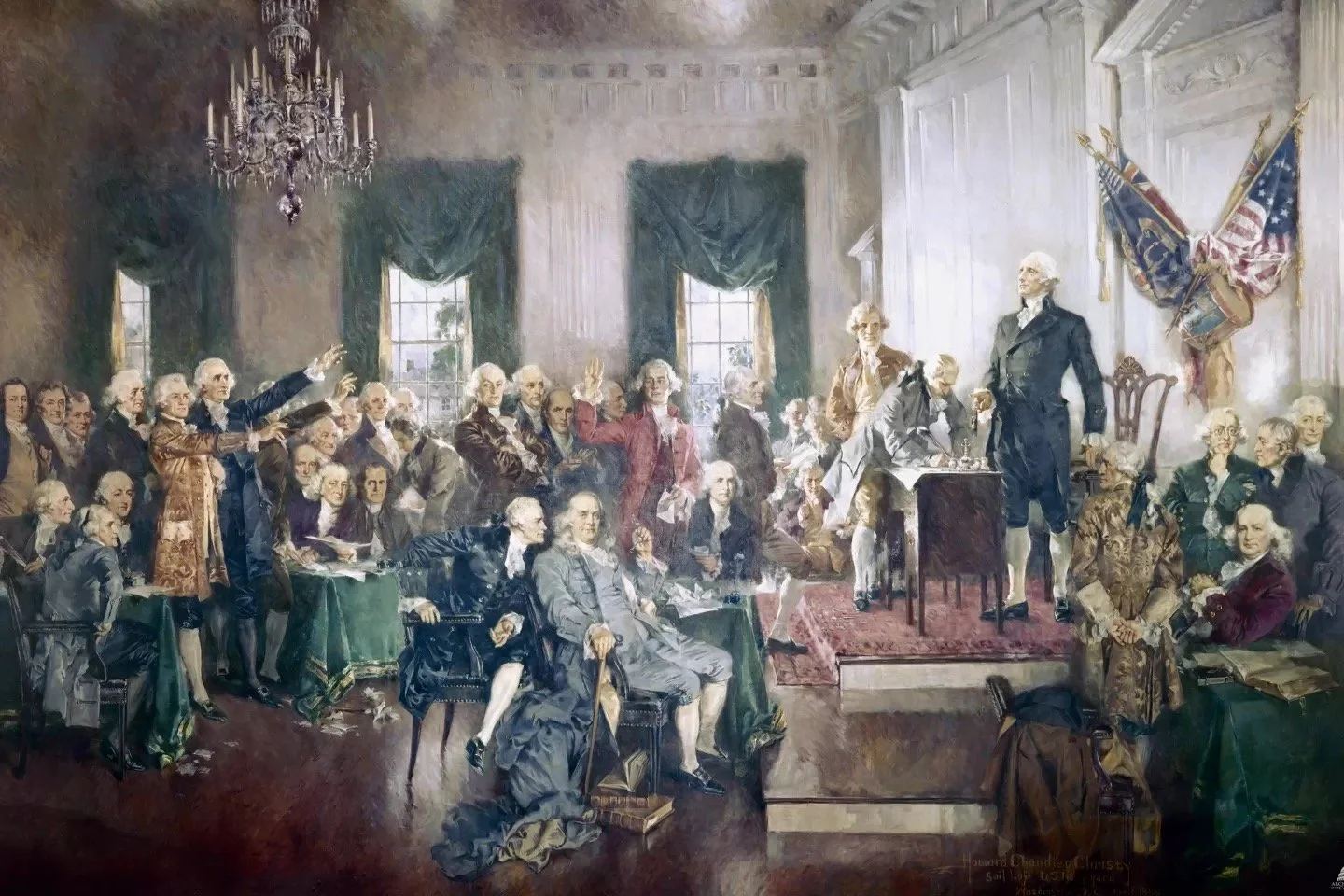 Historical painting of the signing of the Declaration of Independence in the Continental Congress chamber, with many men in period clothing gathered around a table and around the room.