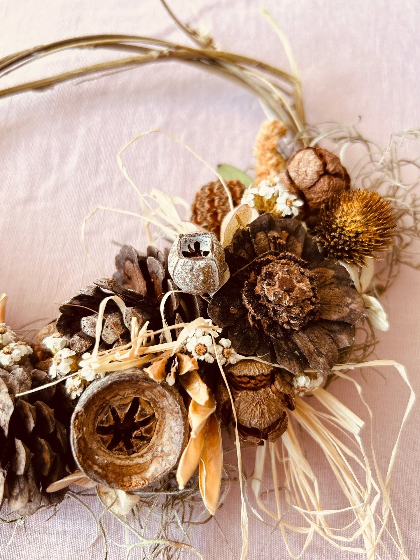 Sweet seed pods and nuts are the heroes in this little wreath. 

They give such warmth and texture, and with the whimsy of tiny grasses and tea tree blossoms, it&rsquo;s a welcoming and calming addition to any room.

Wreaths are not just for Christma