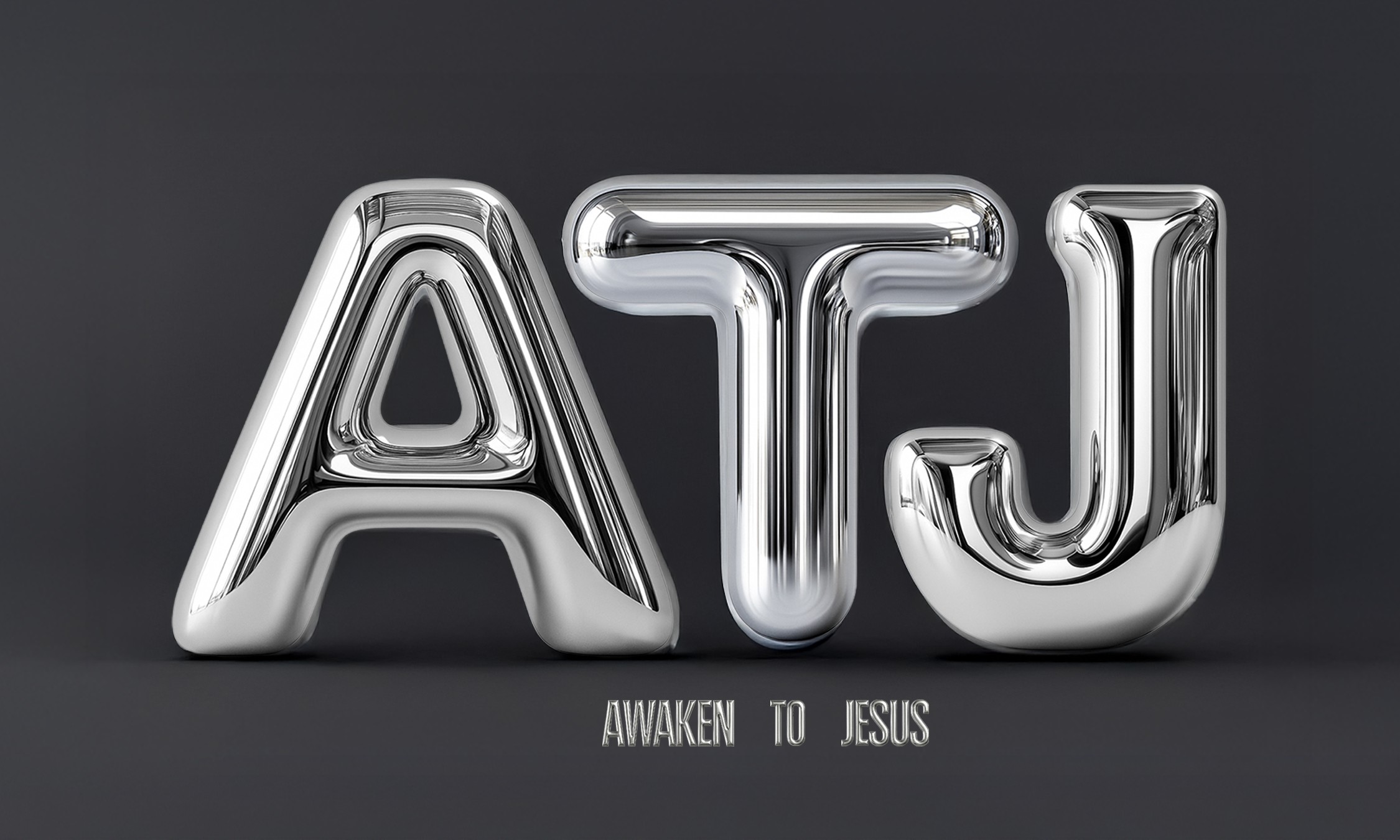 Silver metallic balloons spelling out 'ATJ' with the phrase 'Awaken to Jesus' underneath on a dark background.