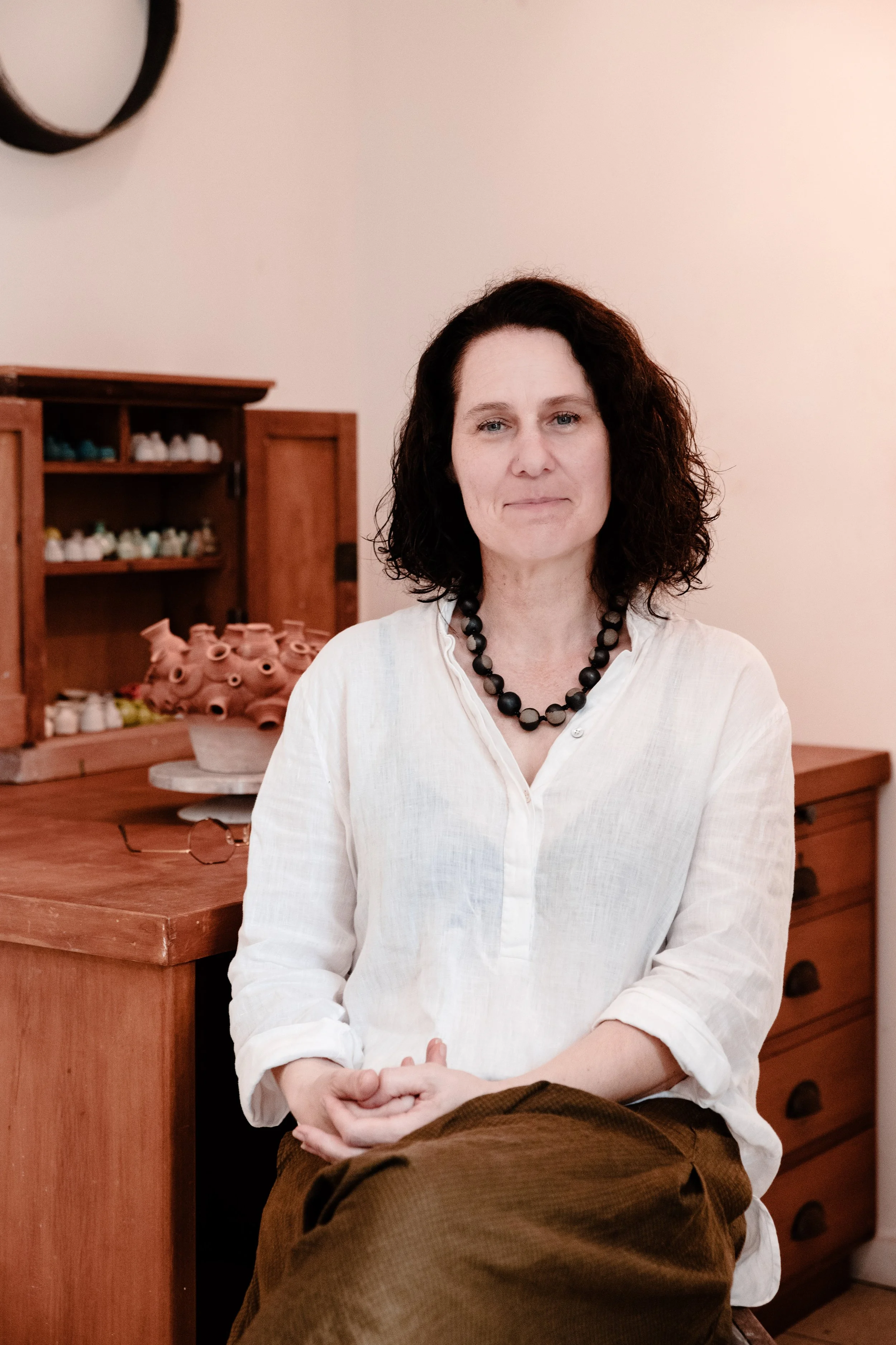 Jude Muduioa in her studio in Brisbane, Australia. This is light filled space that she works in, surrounded by Australian Bush land. The close connection to the outdoors keep Jude grounded and in touch with nature.