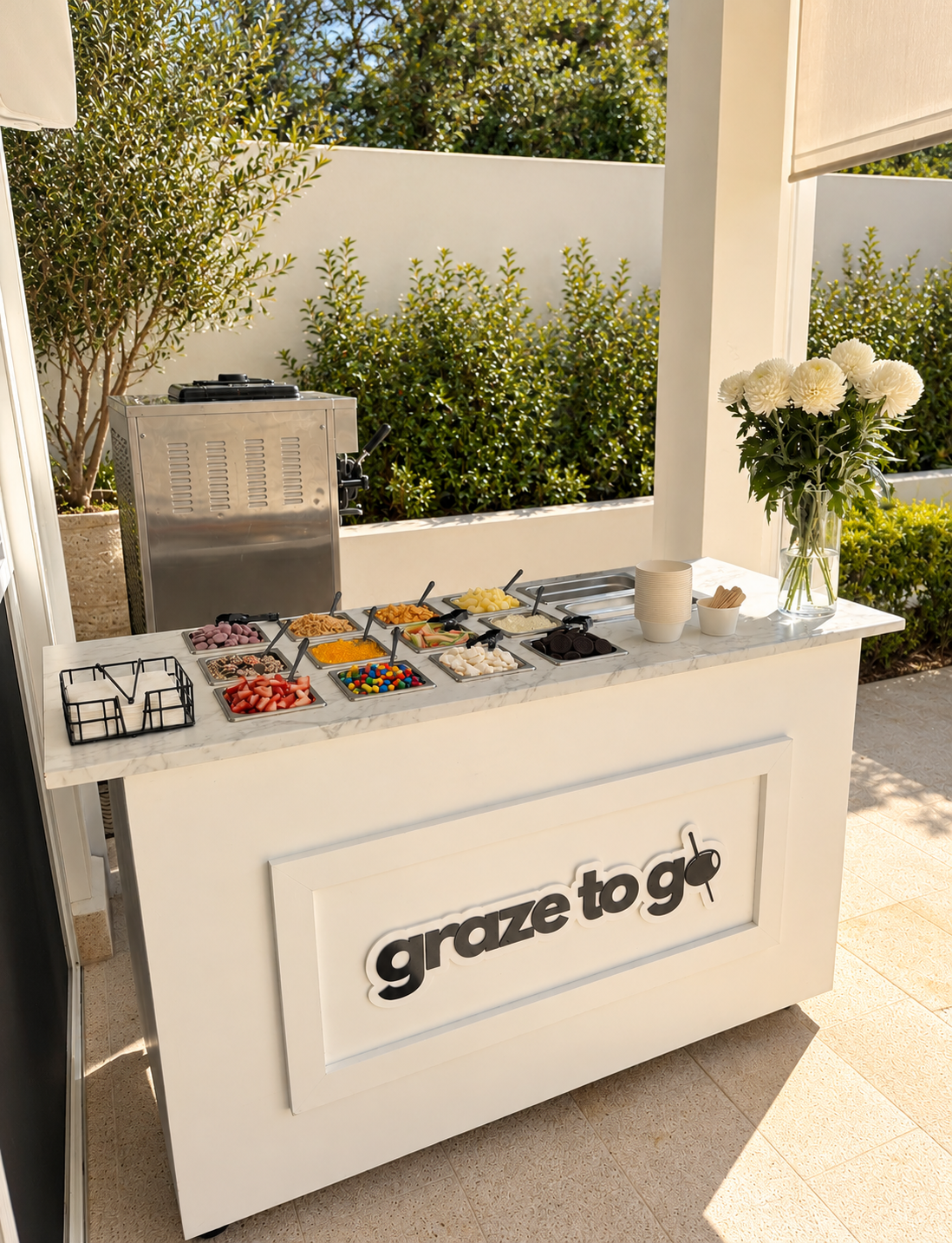 Graze To Go soft serve cart with toppings
