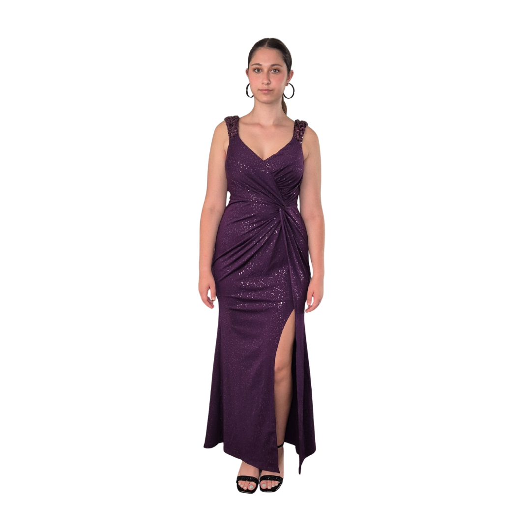 Sahara is wearing a size 14. A gorgeous fabric with a sparkle through out, twist to the side, hugging you in the right places. Thick straps covered in a sequin with a zip up back. Also available in a size 12.