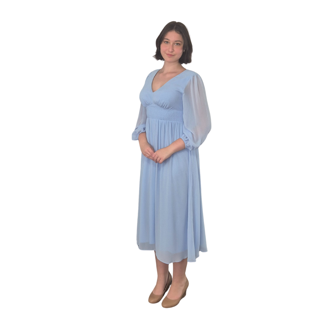 Sahara wearing this sweet 3/4 number in Baby Blue. Gorgeous front detailing and sheer sleeves to compliment.