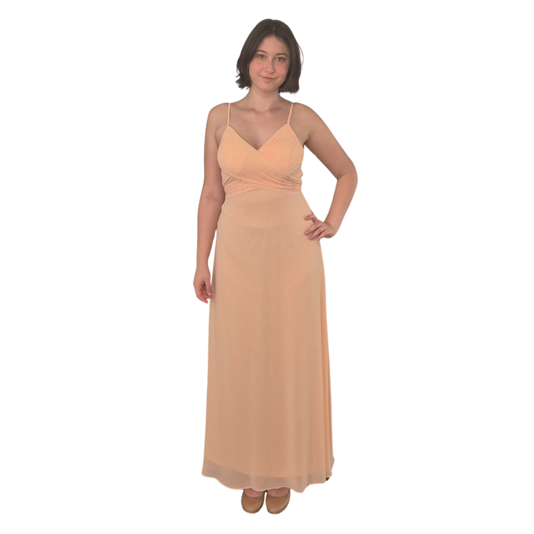 Super sweet the Annaliese Dress. Gorgeous, gathered crossover section detail in the front giving that special feature in the bodice falling into a chiffon bottom. Back of the dress is zip up back with stunning cow-neck feature.