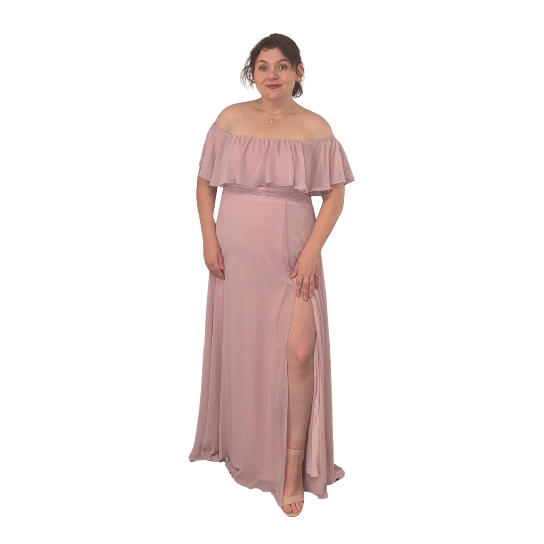 Emily wearing a size 16 in Mauve. Off the shoulder elegance, coverage of the arms and subtle spilt. Gorgeous on all sizes.