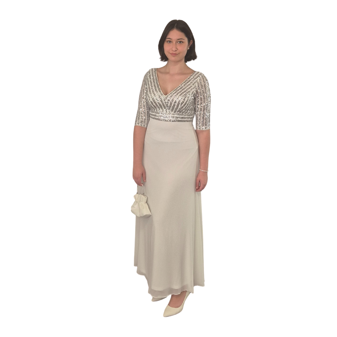 Sahara wearing the size 10. Beautiful soft sequin top half, with zip up back. Stunning fit.