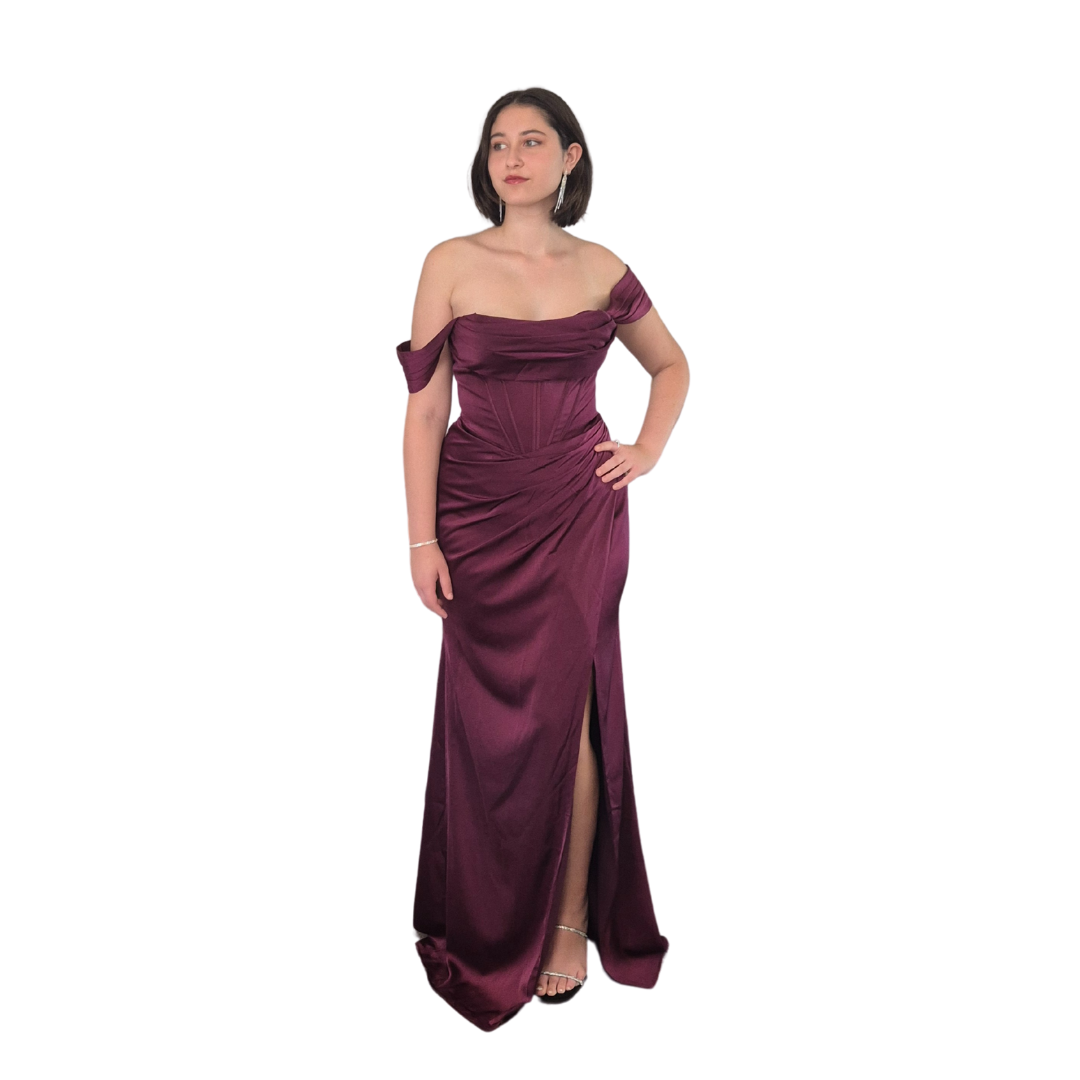 Sahara is wearing a size 12 in the Laurel Dress.
Intricate detail throughout in a deep Eggplant colour. Zip up and tie up back. Wear the straps on the shoulder or off, for a completely different look the straps are removable. Thigh high split.
Availa