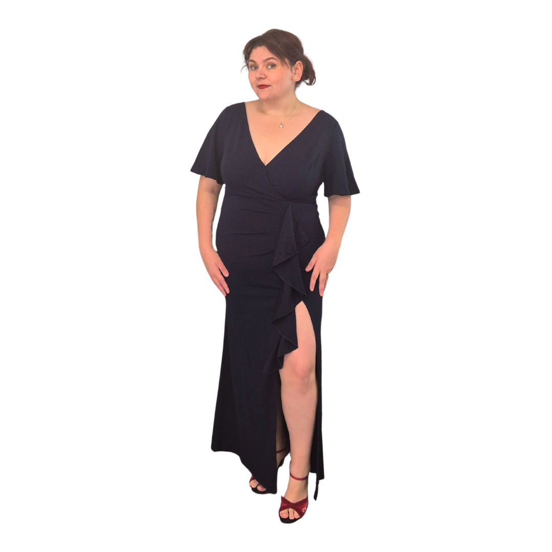 Emily wearing the size 18 in the Tamara Dress, gorgeous stretch material flattering in all the right places.
Available also in a size 20.