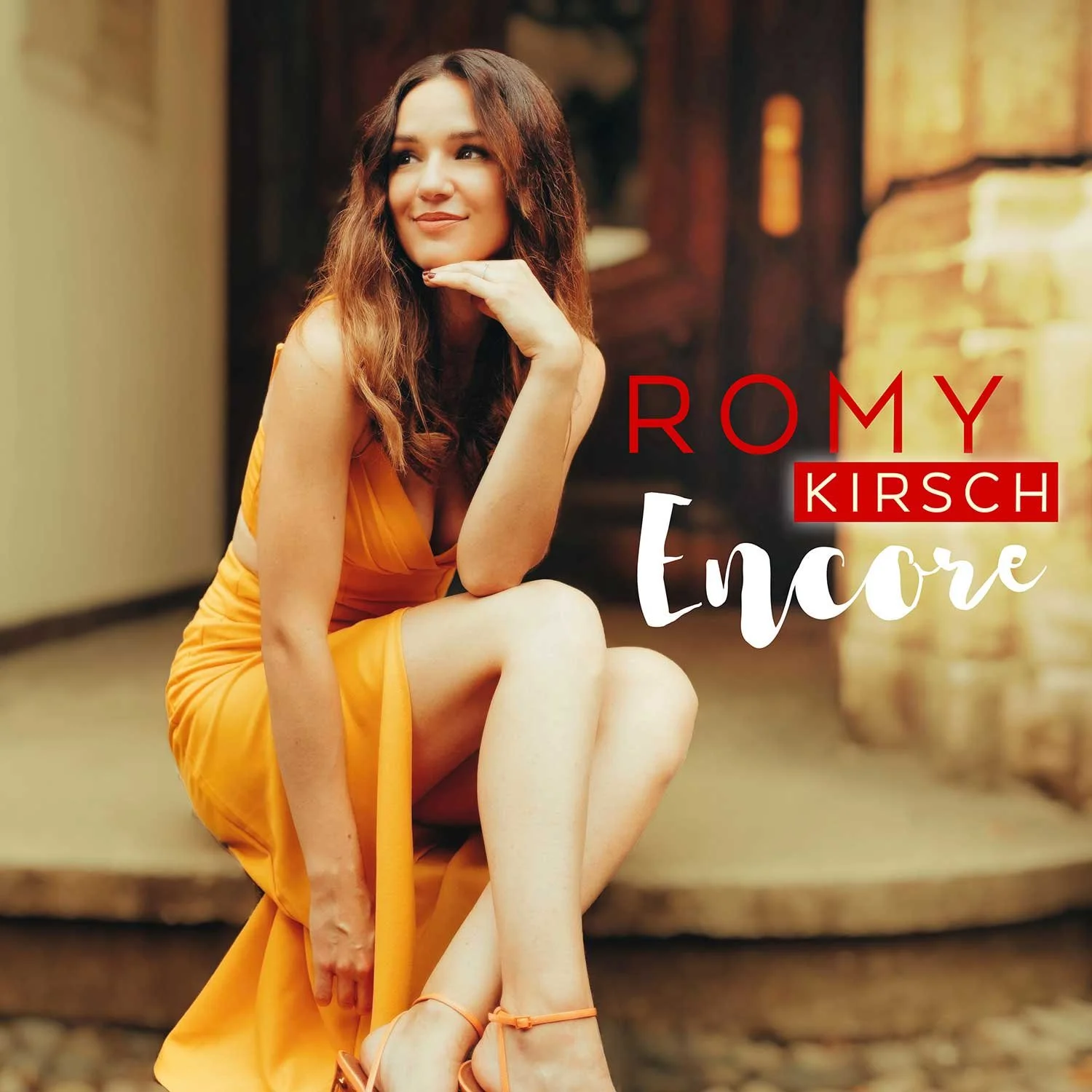 Das Cover mit Romy Kirsch, die nachdenklich in die Ferne schaut. Text auf dem Cover lautet: "Romy Kirsch - Encore".
