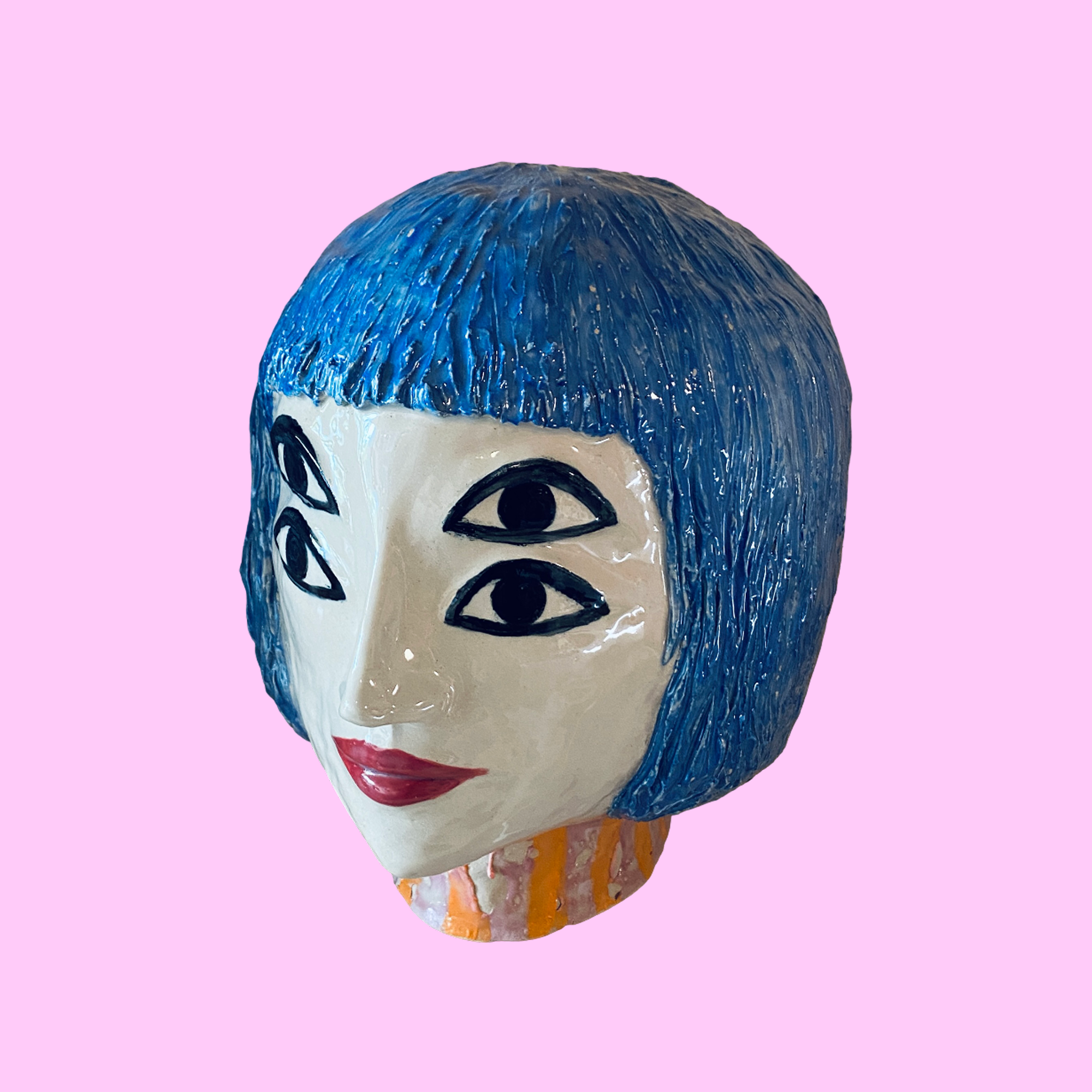 Stort keramik hovede med to sæt øjne