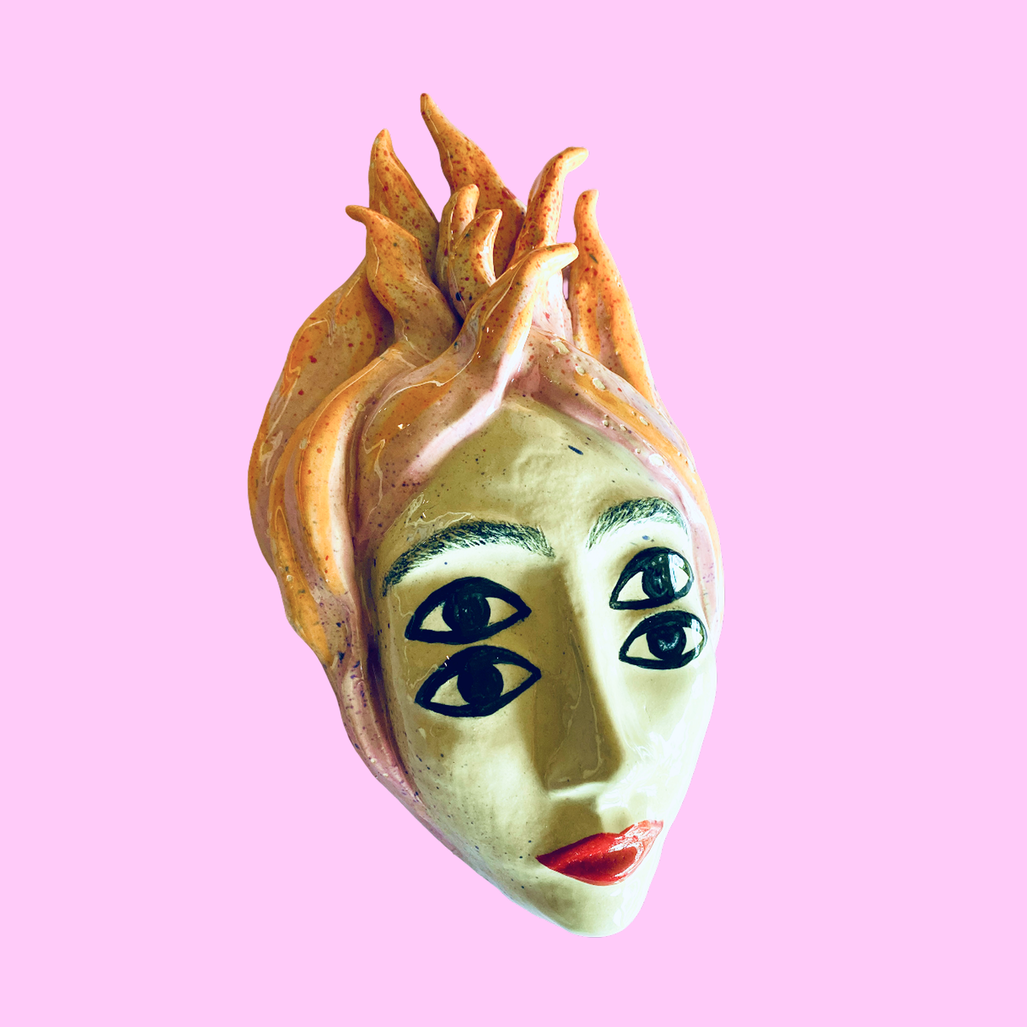 Keramik hovede med ild i håret