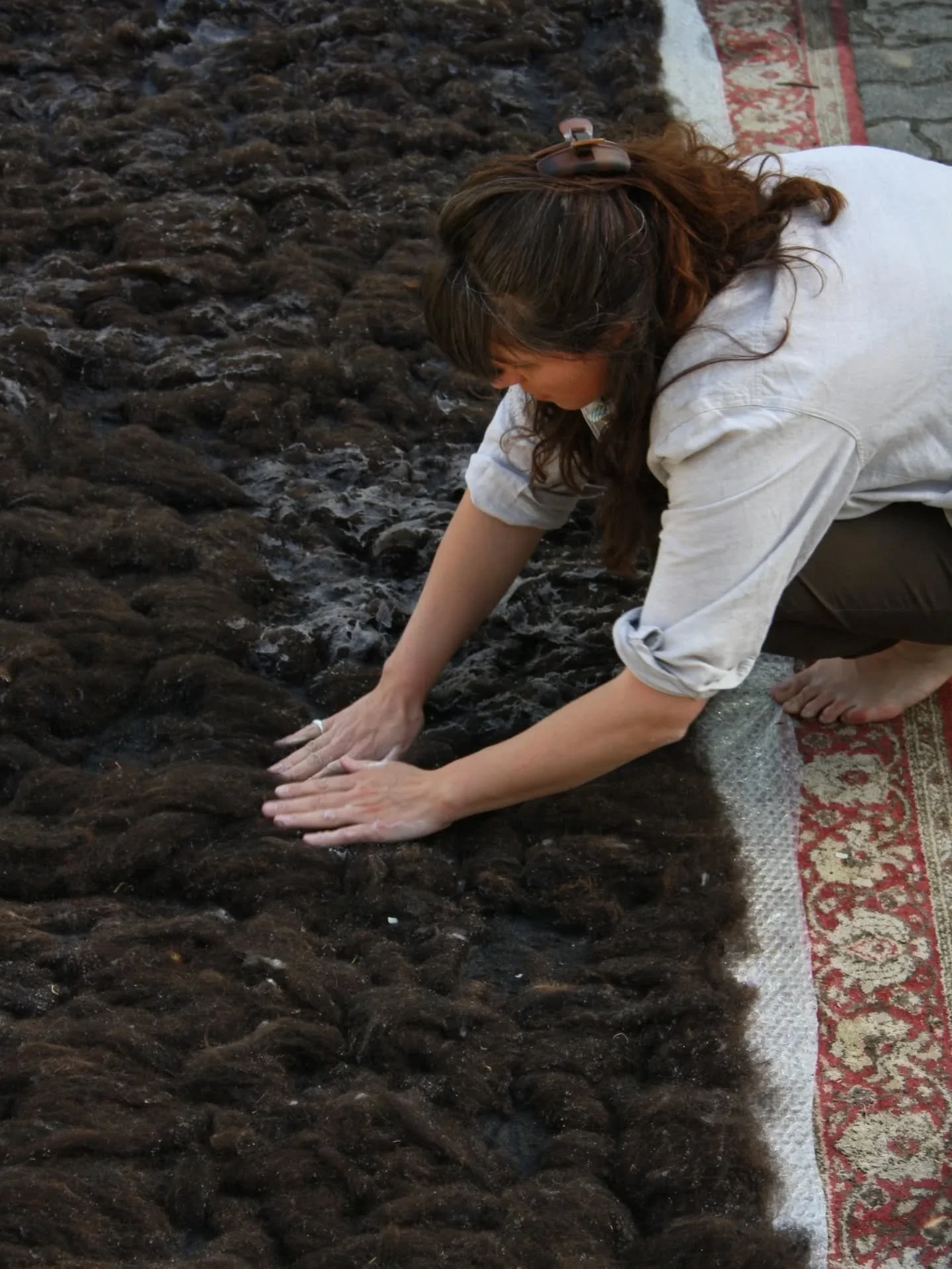 Felting, felting, felting...
After days of carding wool, @nalba.ig &mdash; the design duo formed by @lavinia_ghimbasan and @capucinerobert &mdash; moved on to the slow, physical, and immersive process of wet felting during their residency at @farmlab