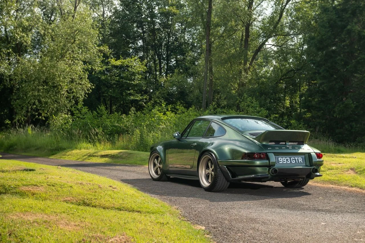 911 EVO GREY side profile showcasing EVO body pack and stance