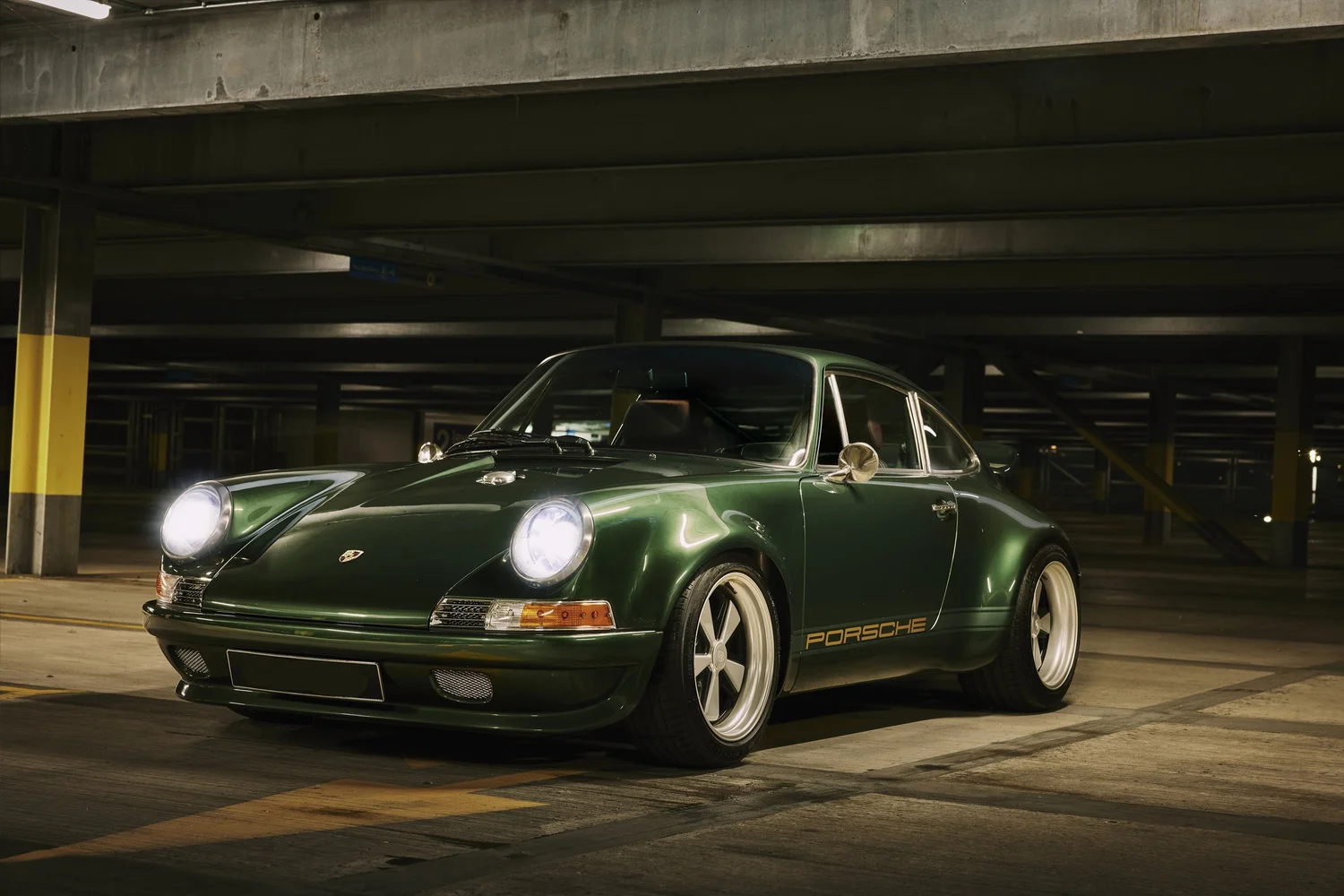 Green Porsche 911 backdate built on an air-cooled donor