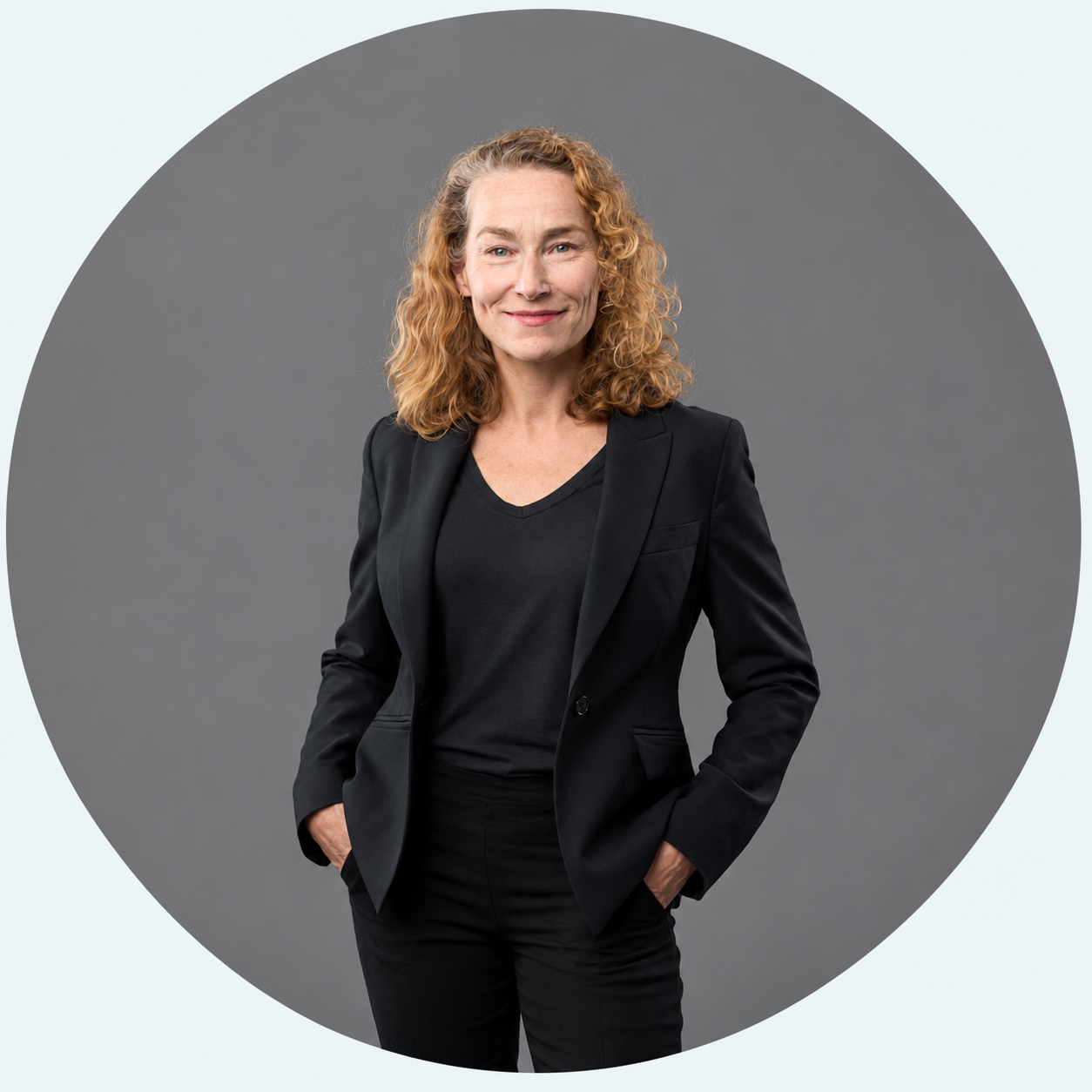 Nichole McGarry, Calgary litigation lawyer at Osprey Legal, wearing a black blazer.