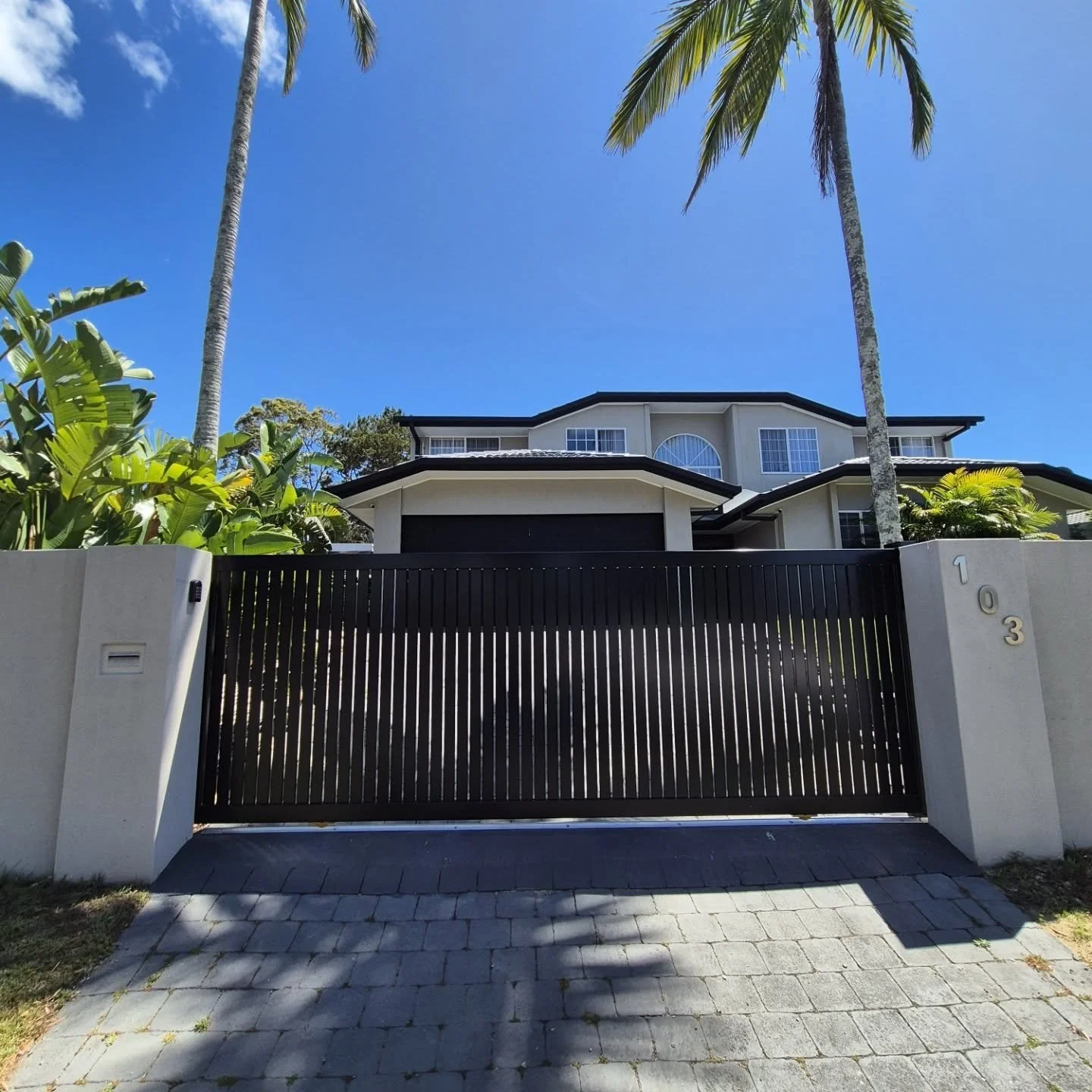 Built with a heavy-duty frame and 65mm vertical slats with a clean 10mm gap for a modern, premium finish. Powered by a CentSys D5 smart motor, delivering smooth, reliable automation every time.

Designed to increase security, privacy, and street appe