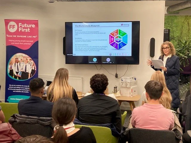 Markerstudy employee talking to a group of young people at an Insight Day organised in partnership with Future First