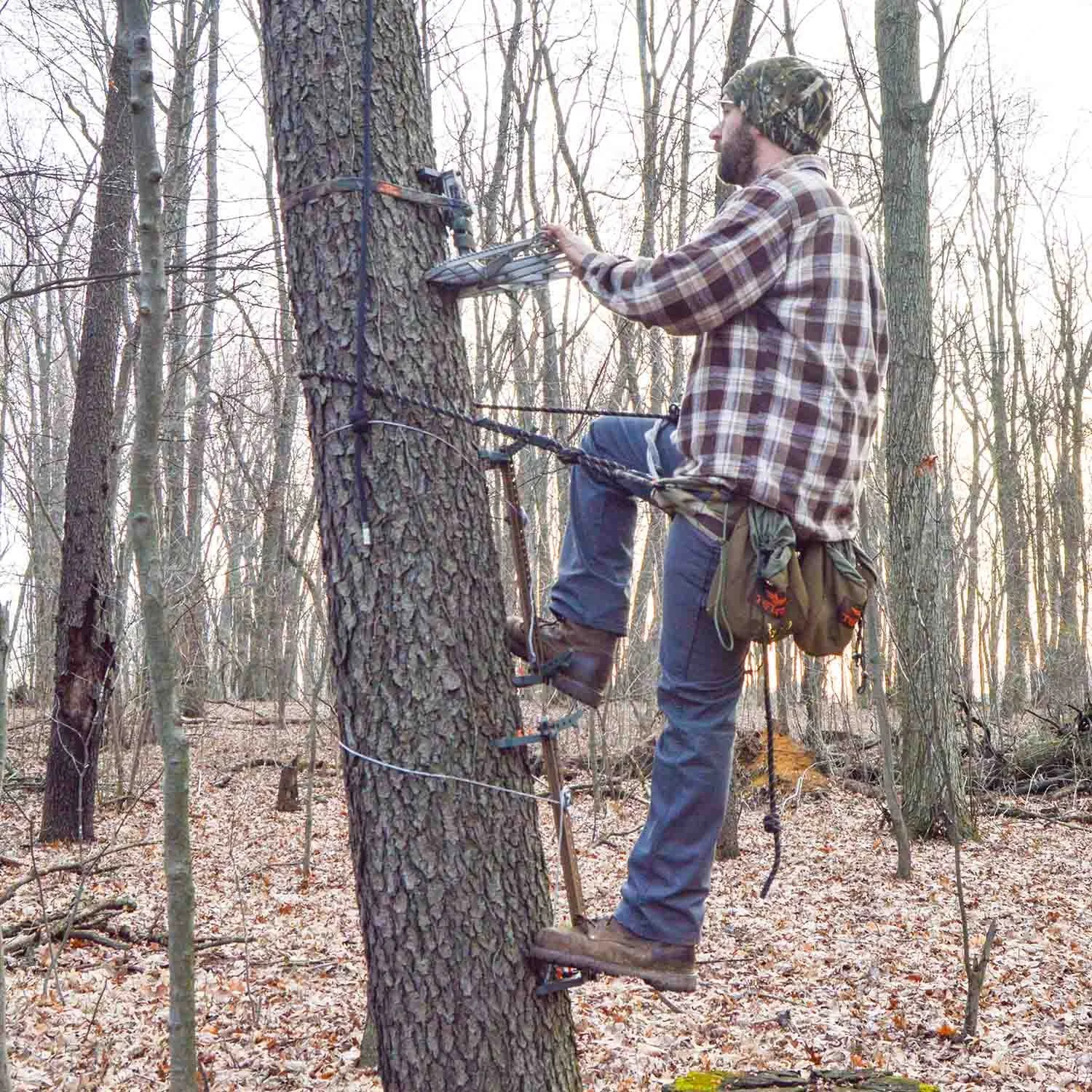 Using-Climbing-Sticks-To-Access-Hunting-Saddle-Platform.jpg