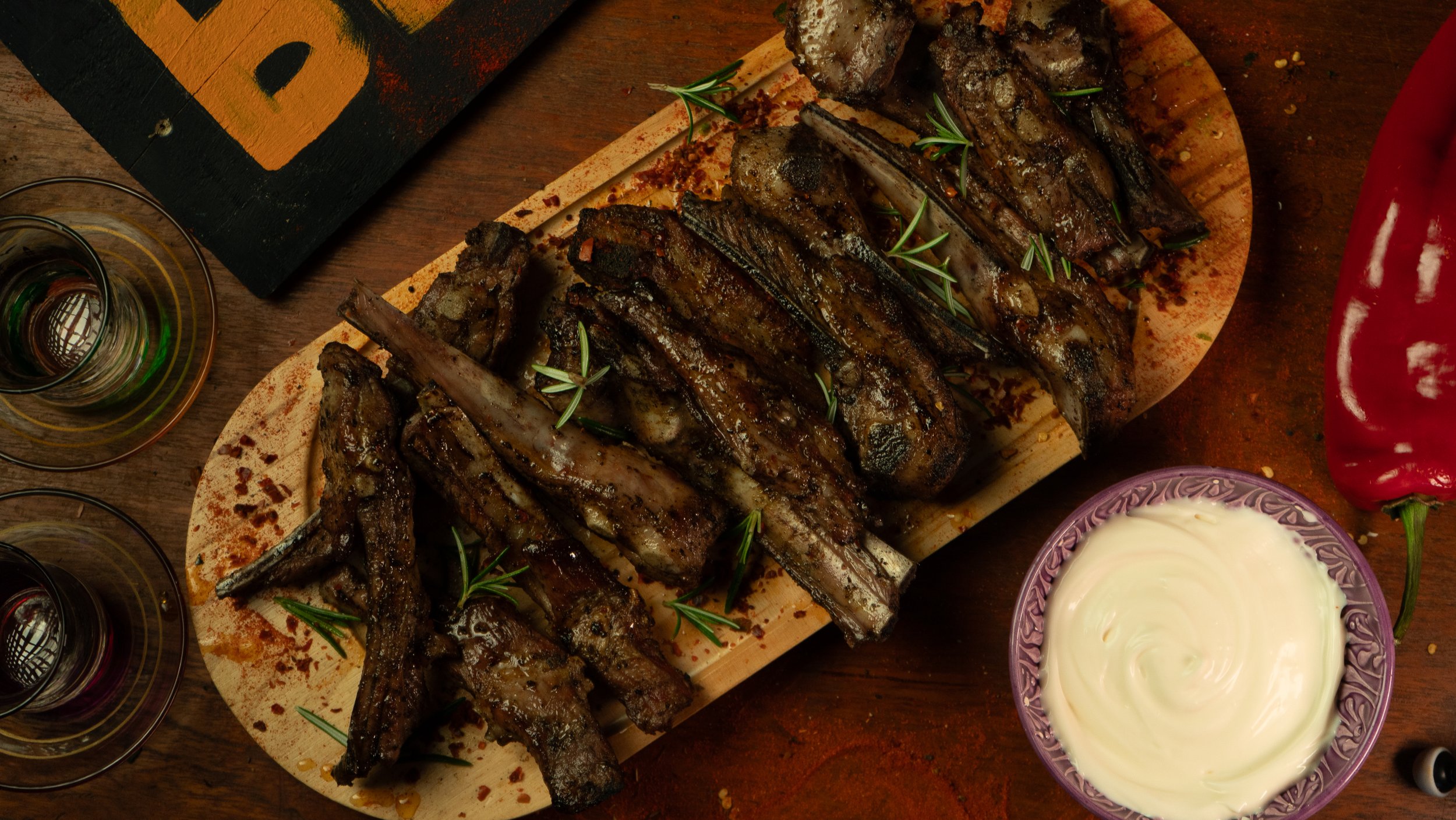 Lamb Ribs - Barbecued over charcoal to tender perfection. Two flavours are available: Sweet and sticky BBQ or Turkish