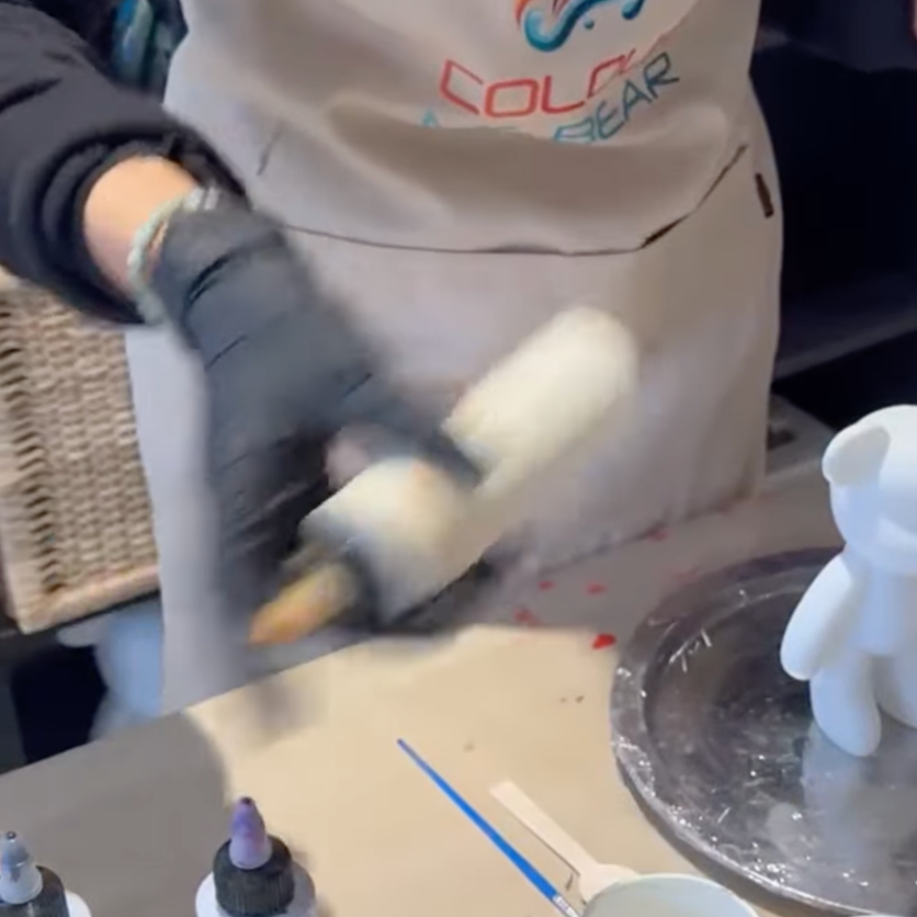 Paint bottles being shaken