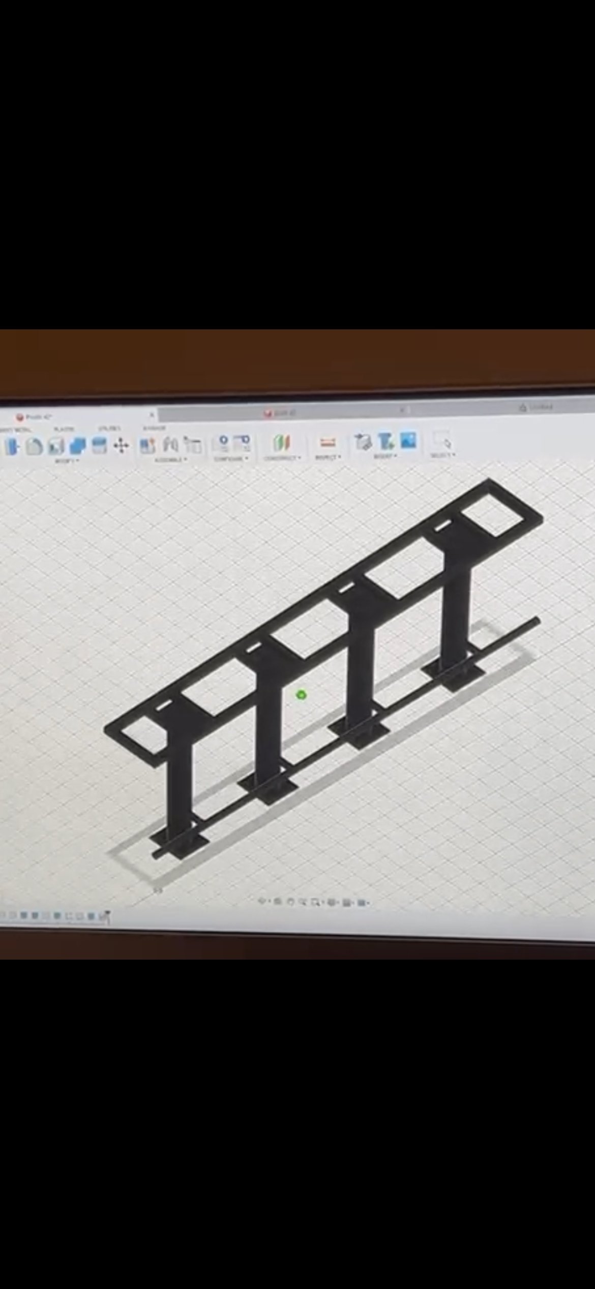 3D model of a scaffold structure shown on a computer screen in CAD software.