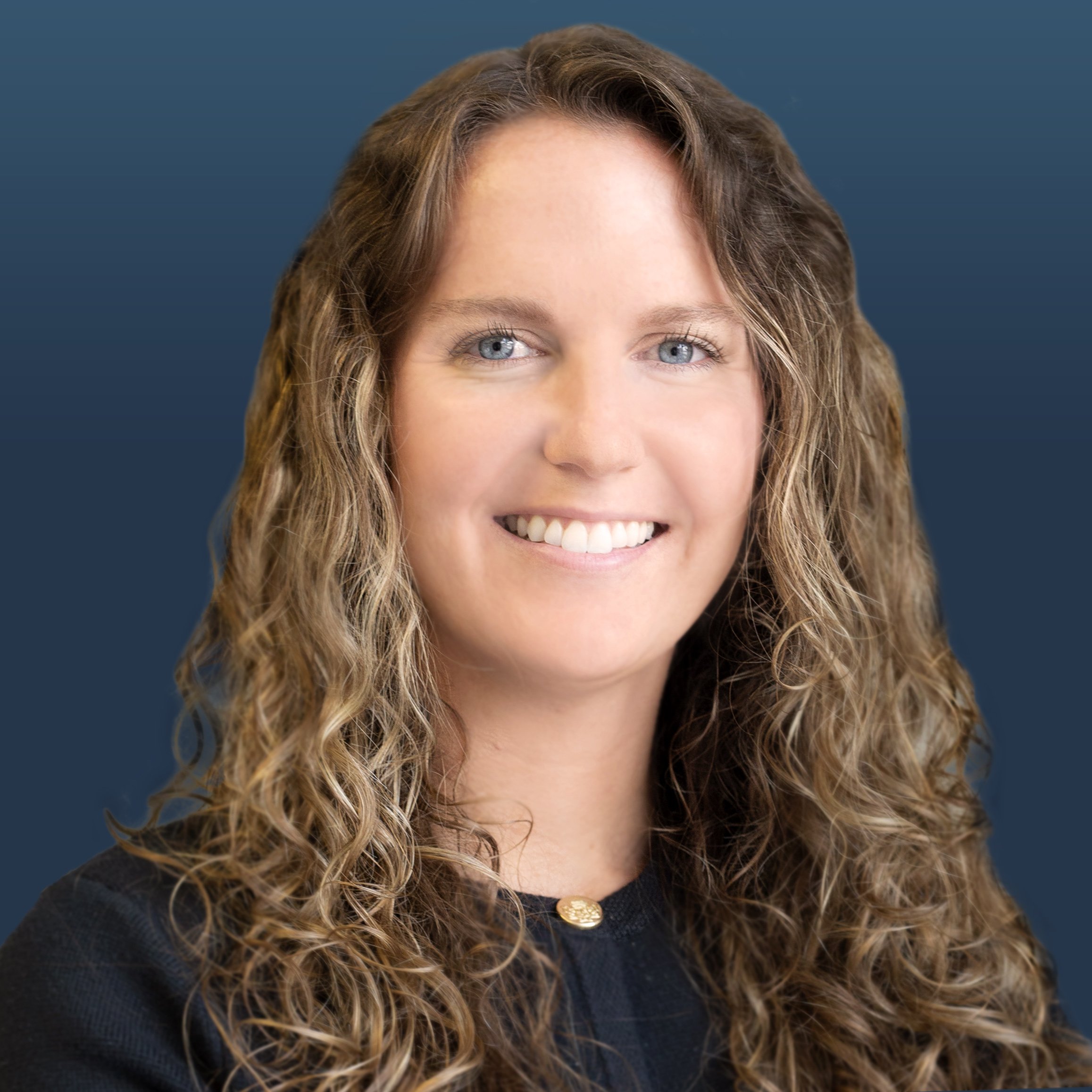 Portrait of a friendly female with brown hair, dressed professionally that is a Senior Legal Assistant at Battlefield Law Group.