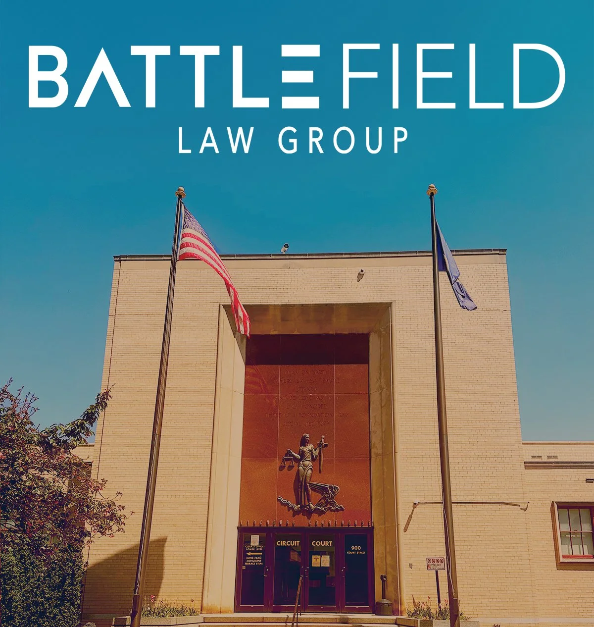 Front of the Lynchburg Courthouse against blue sky with Battlefield Law Group Logo at the top
