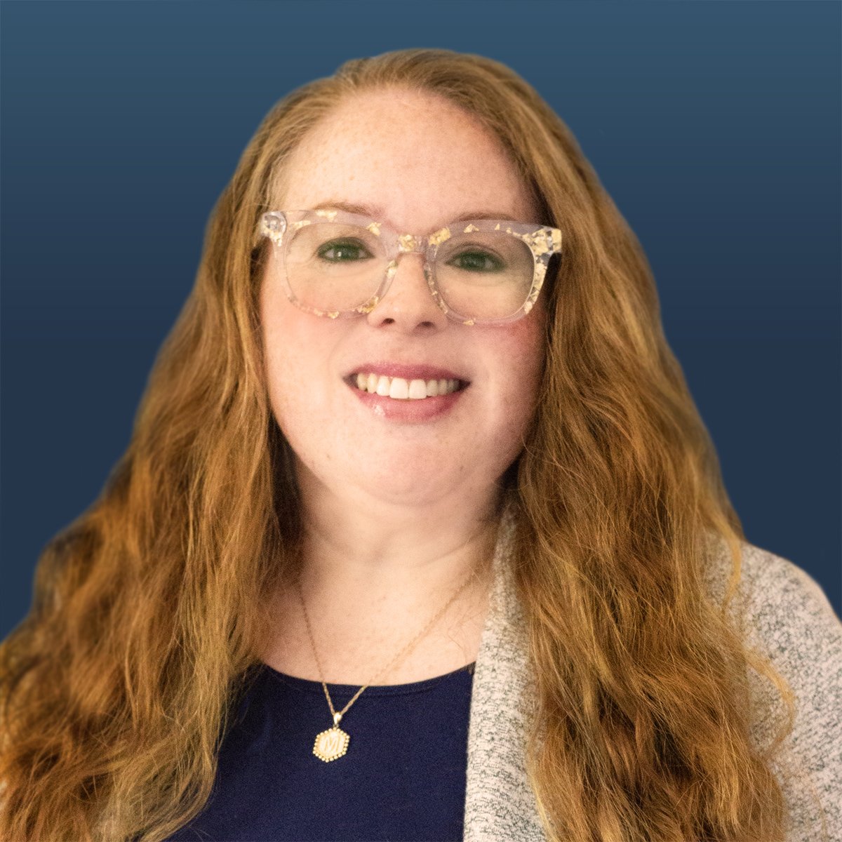 Professional Legal Assistant with red wavy hair and glasses