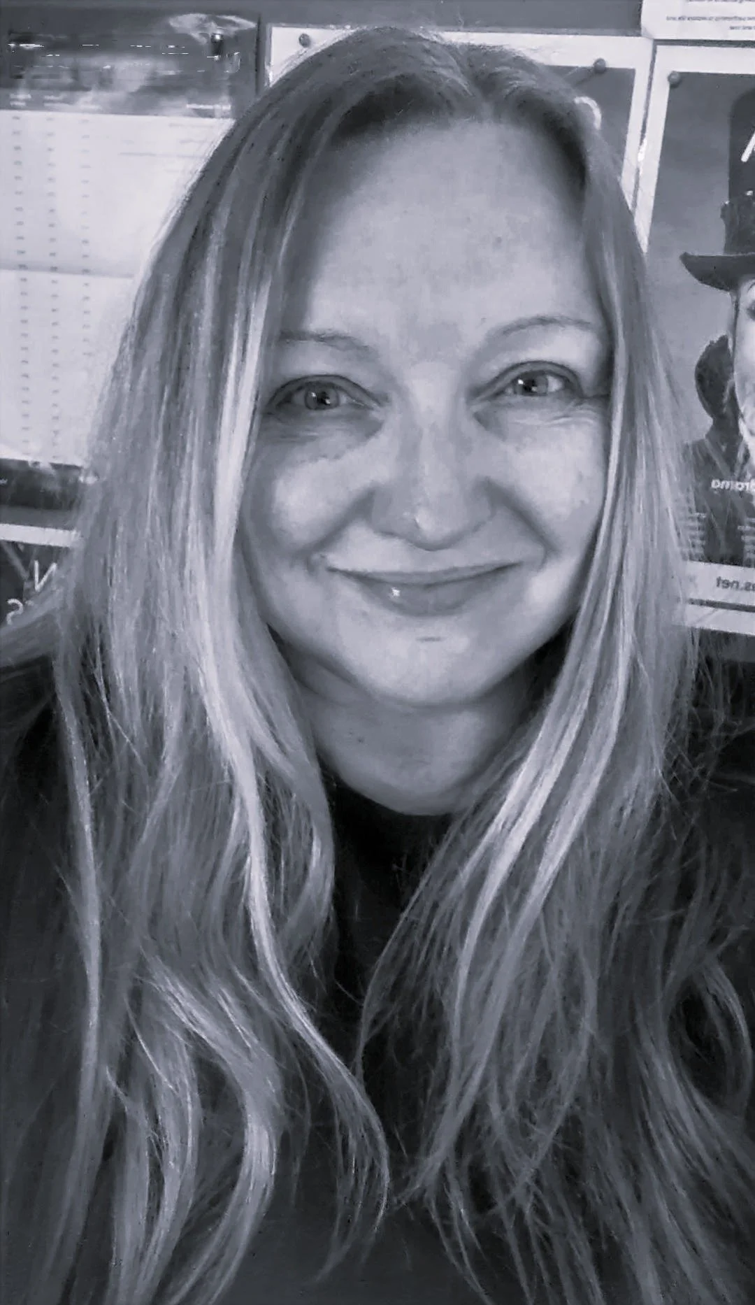 A smiling experiences Business finance and entrepreneurship mentor, ready to welcome and support young people looking for careers experience