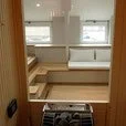 sauna et son poêle vu de l'intérieur espace de bien-être privé