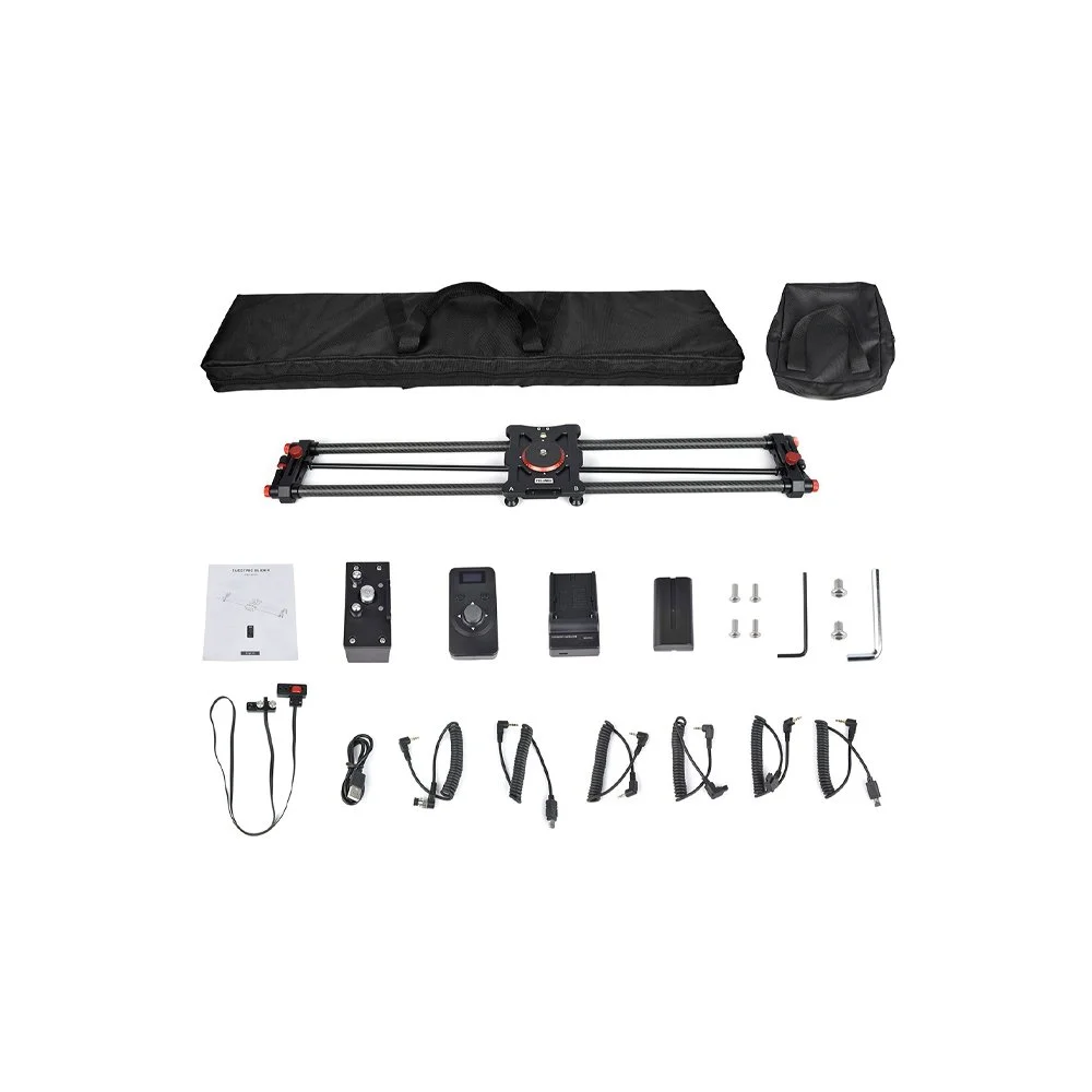 Fotograferet udstyrssæt med to sorte tasker, slim line skudramme med justeringsmekanisme, kontrolenheder, kabler, skruer og små værktøjer.