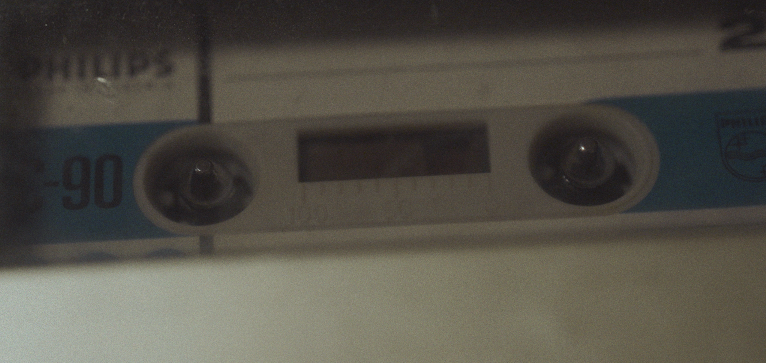 Nærbillede af et kassettebånd | Dokumentarfilm | Retrograd | Esben Persson & Anders Mielcke | Filmproduktion Aarhus | GESTALT