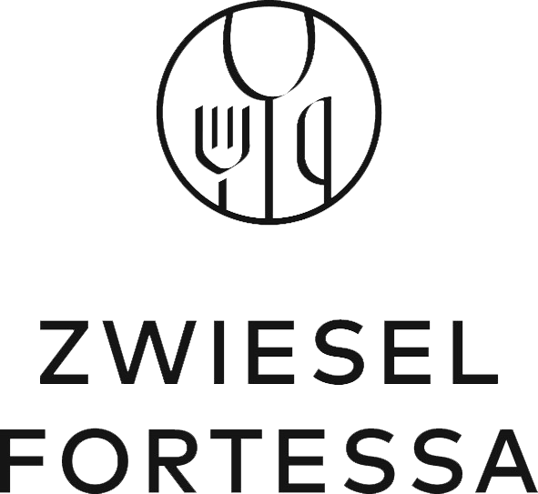 Black logo featuring a circle with a fork, knife, and spoon design inside, and the text "ZWIESEL FORTESSA" below.