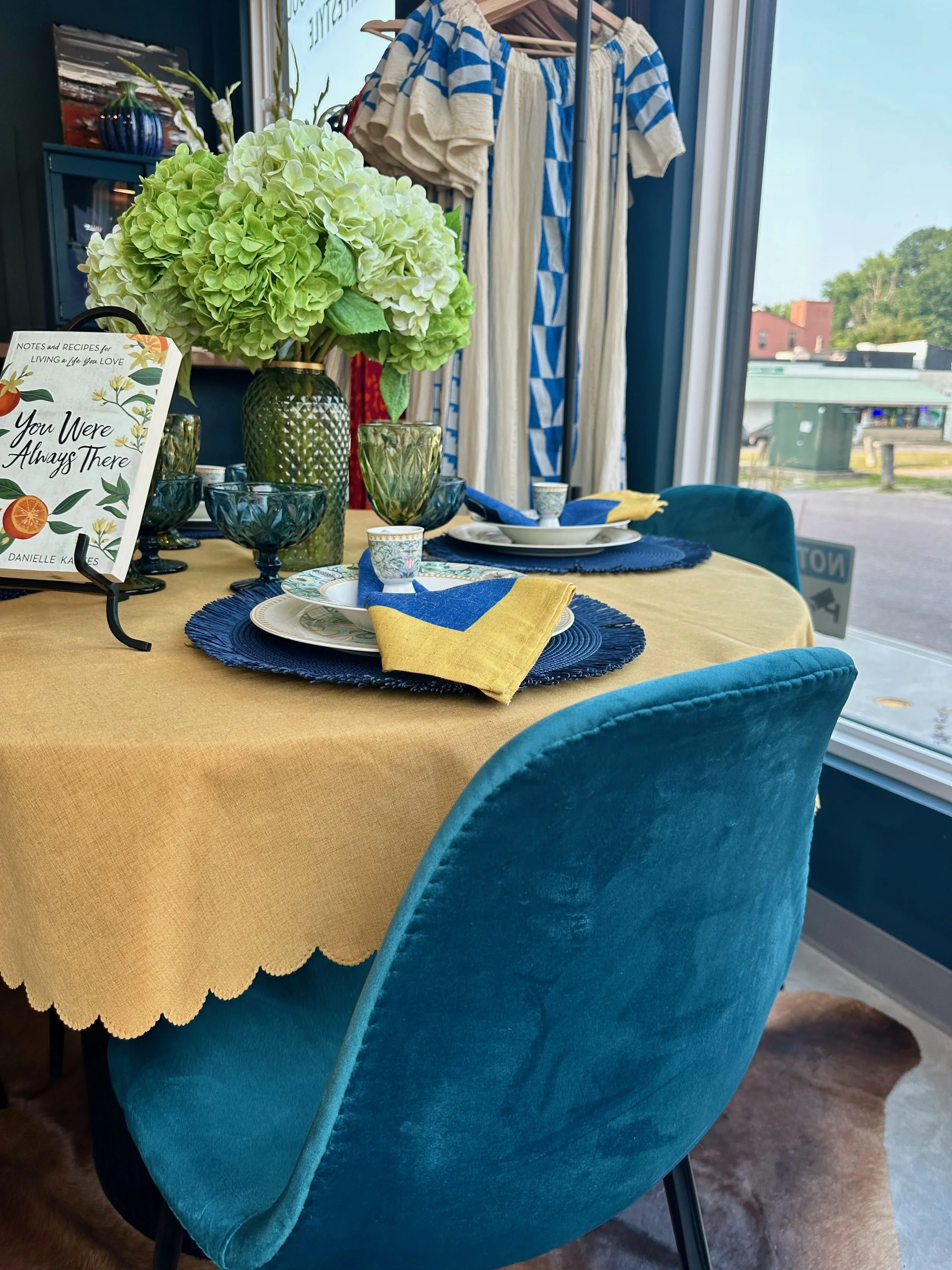 Teal Velvet hairs and real touch hydrangea faux florals complete the look