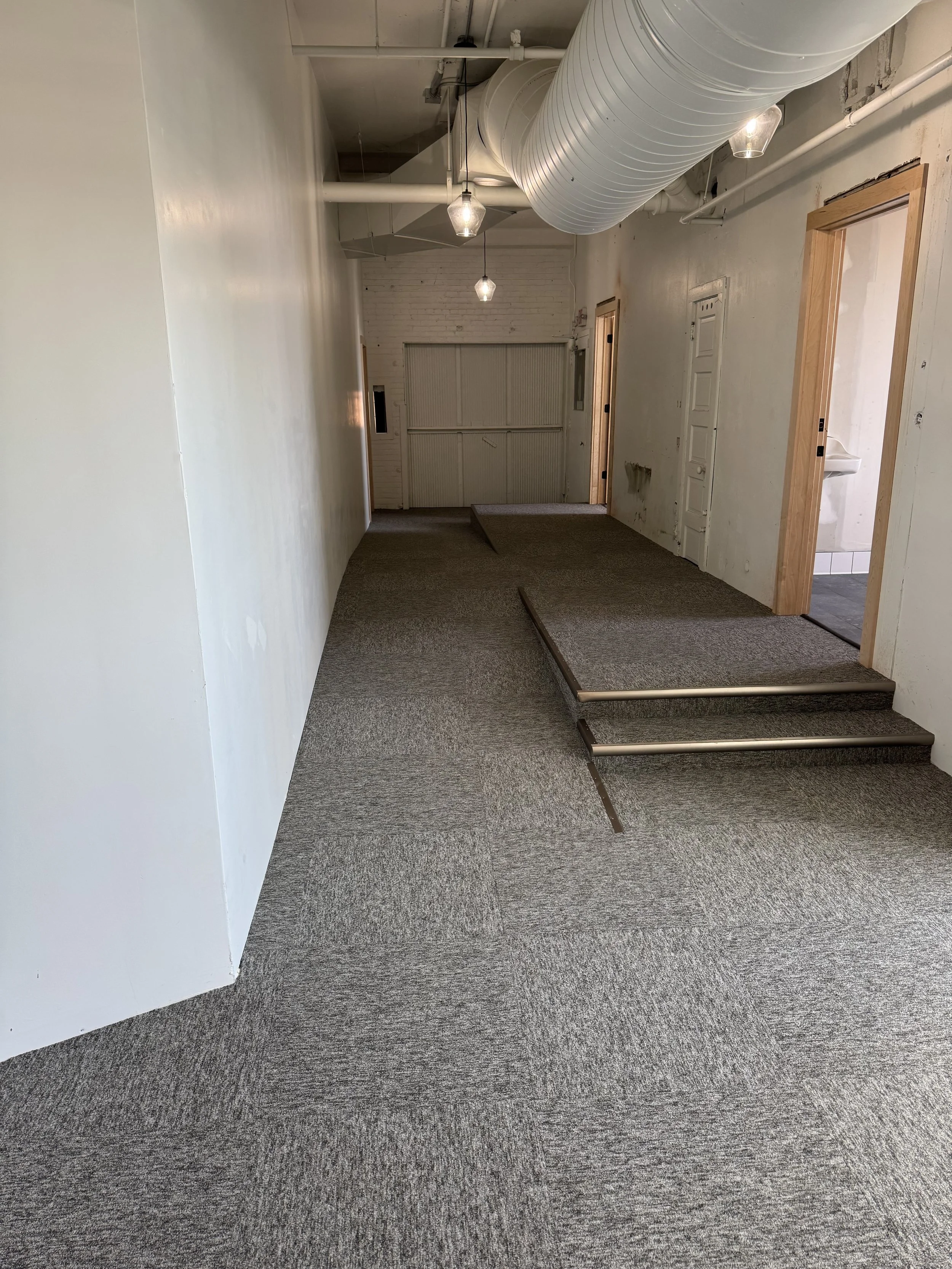 Access to a freight elevator and 2 single use bathrooms within unit