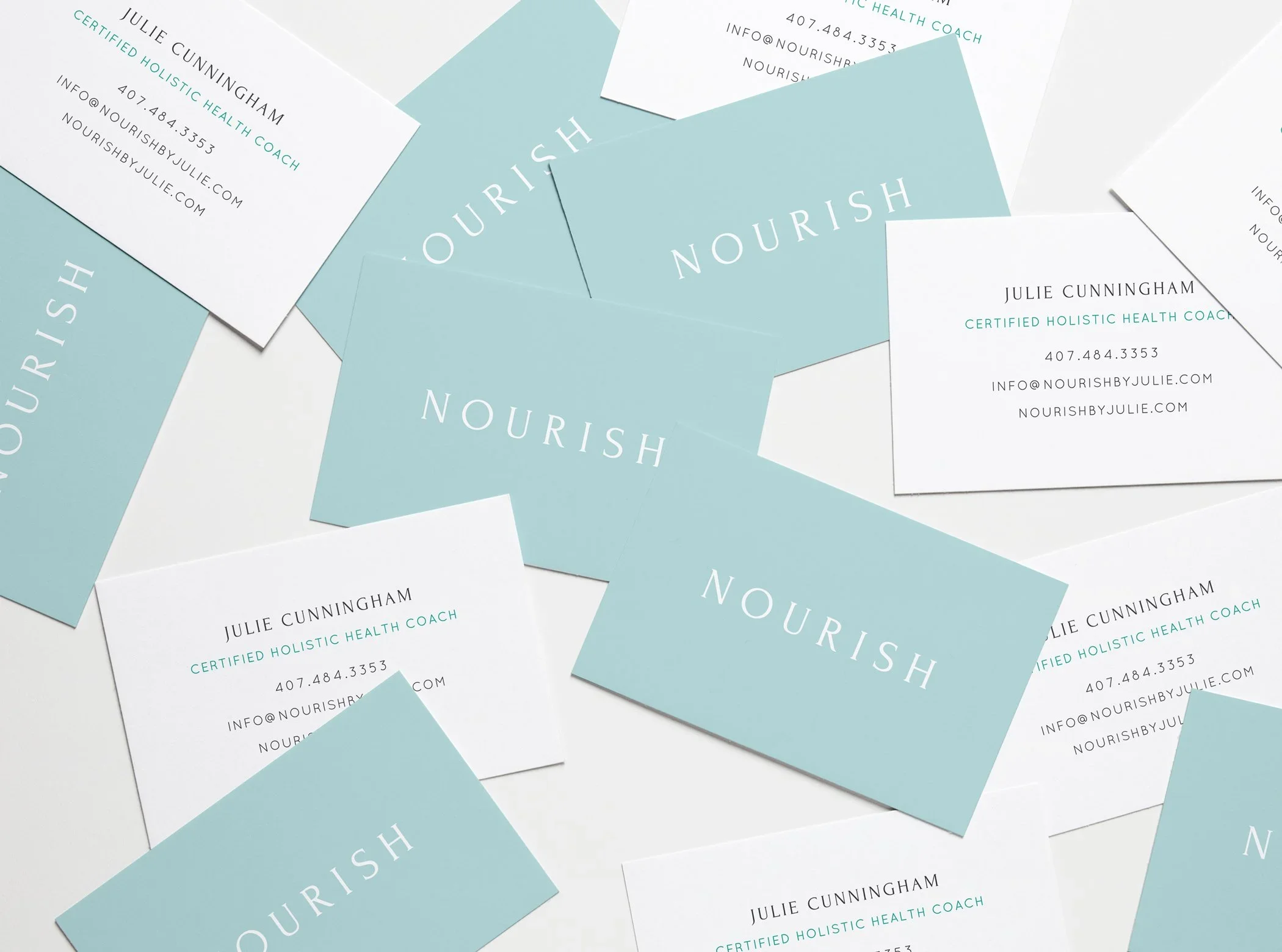 nourish_scattered-business-cards.webp