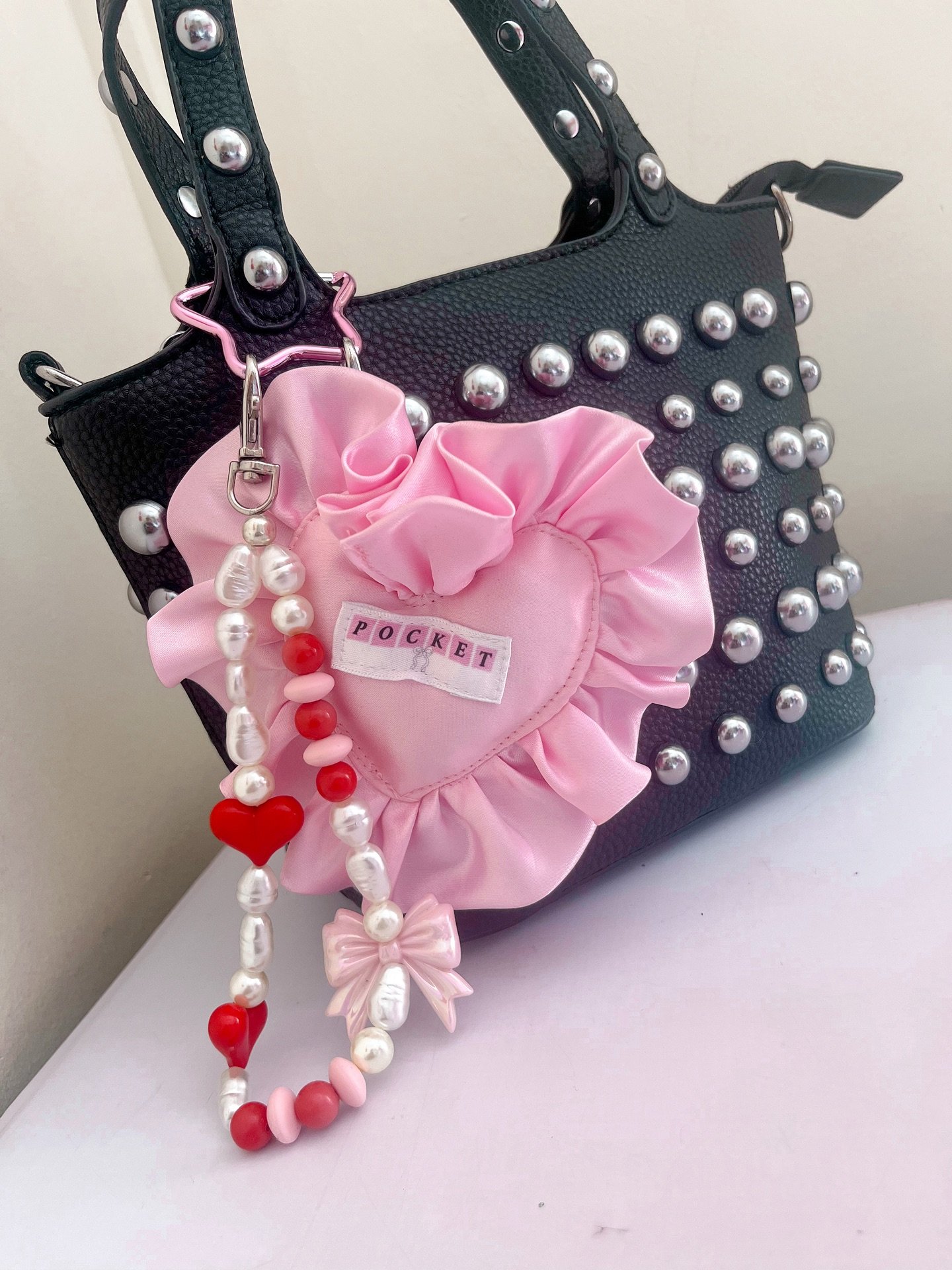 ✨We love a bag charm!!✨

Both beaded and frill heart bag charms are available to buy! Each sold separately. Beaded bag charms are all one offs and come with the star carabiner and are ready to ship💓💓💓