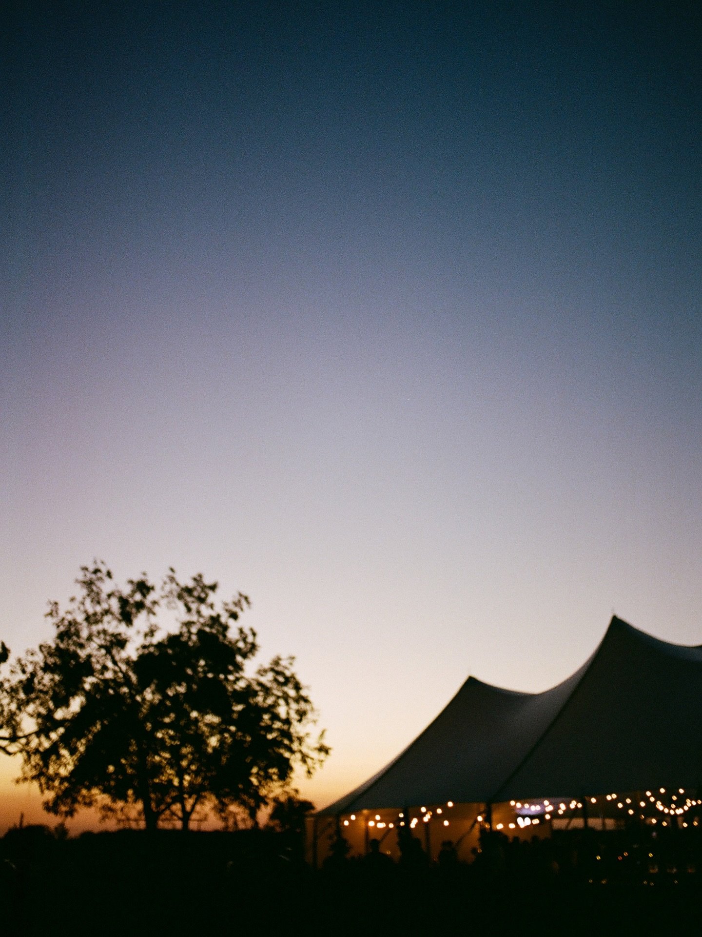 A night under the tent with Emily and Sam on film. 

Planner: @quintessentialeventskc 
Catering: @localseasonskc 
Bartending: @sidecar_kc 
Dessert: Baby Bird Bakery
Band: @twiceonsundayband 
Photo:@delaneyhady 
Florist: @kaycee_blossom_designs 
Renta