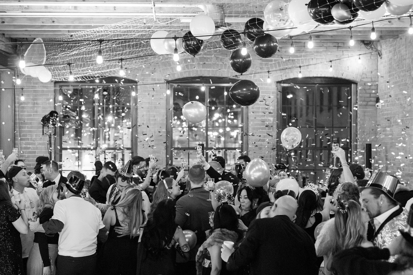 Emily and Kaleb&rsquo;s wedding day was a candlelit night of happy tears. Made complete by the best NYE t-shirt toss I&rsquo;ve ever seen. A full dance floor, confetti canons, and an epic balloon drop was the perfect way to ring in 2026. 

If it isn&