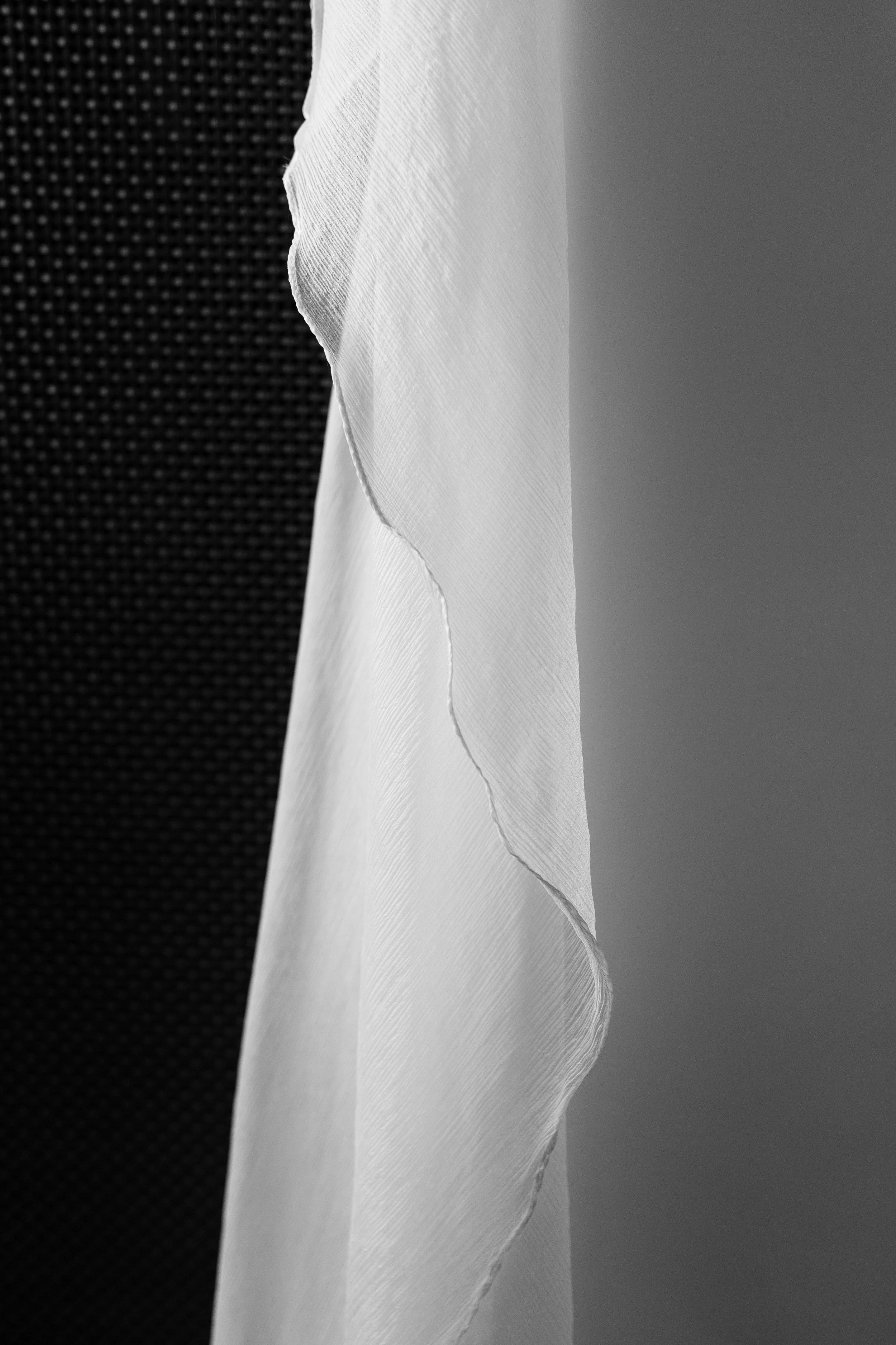 Close up photo of wedding dress cape texture.