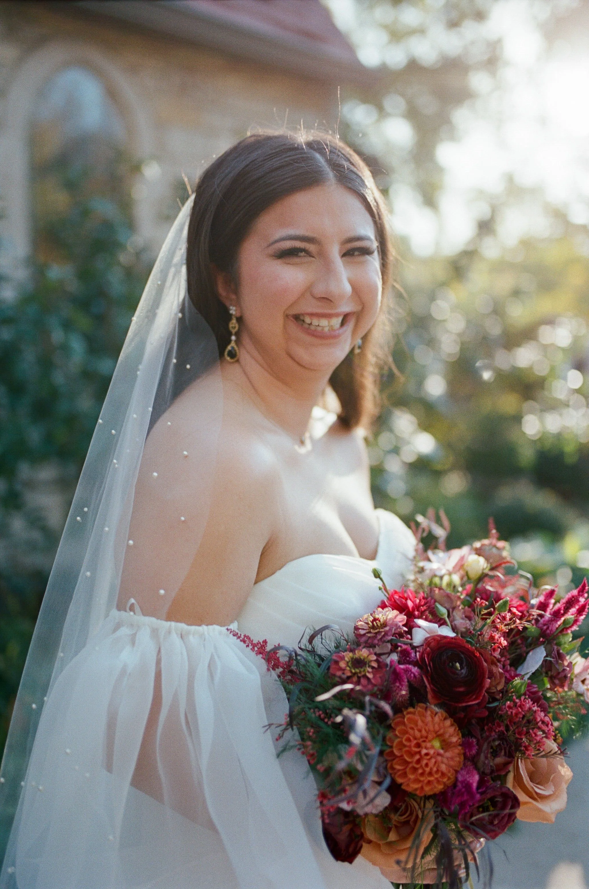 Portrait of a bride on her wedding day outside of Pilgrim Chapel