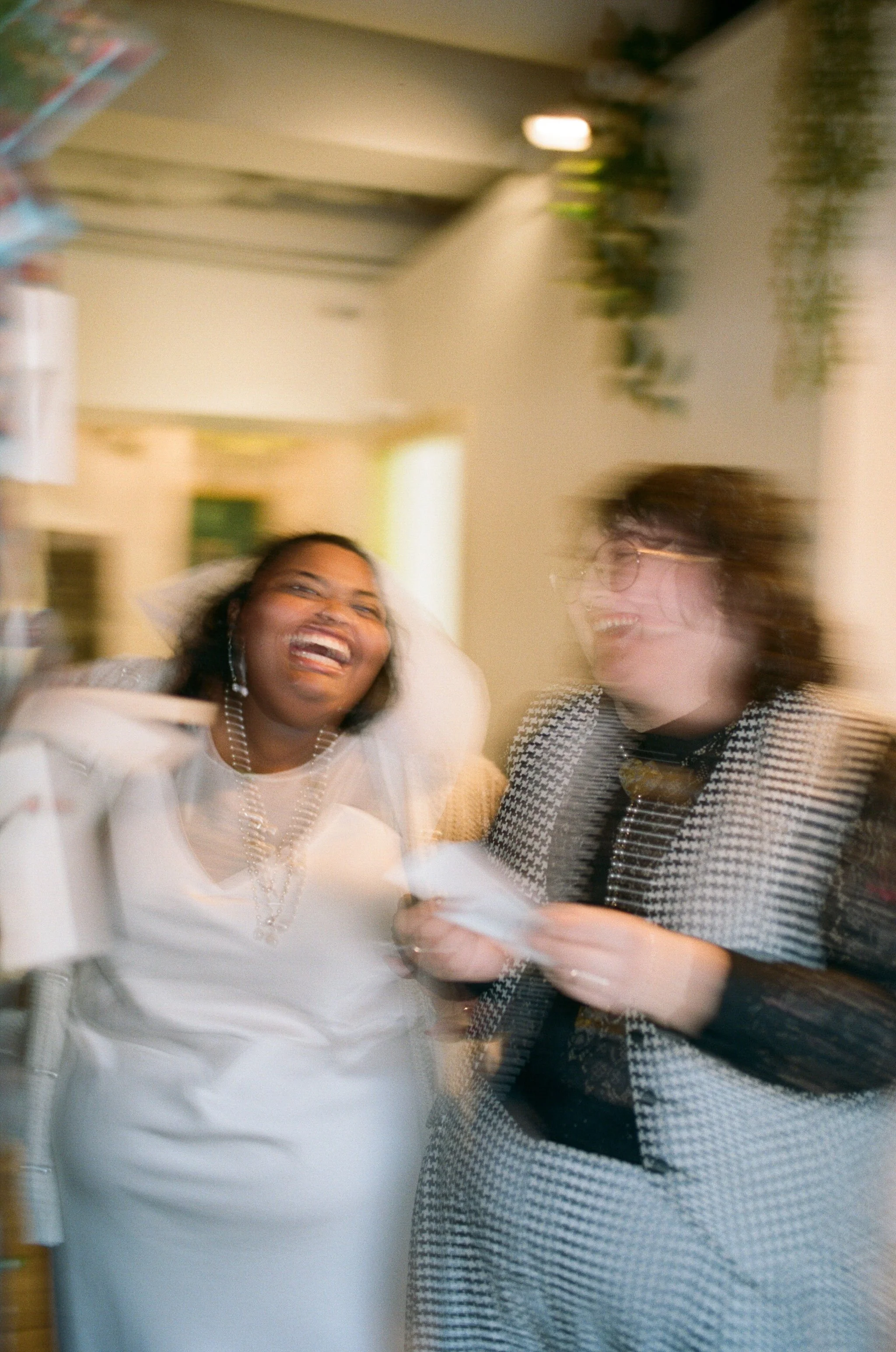 Celebrating after getting a photo strip at Betty Rae's