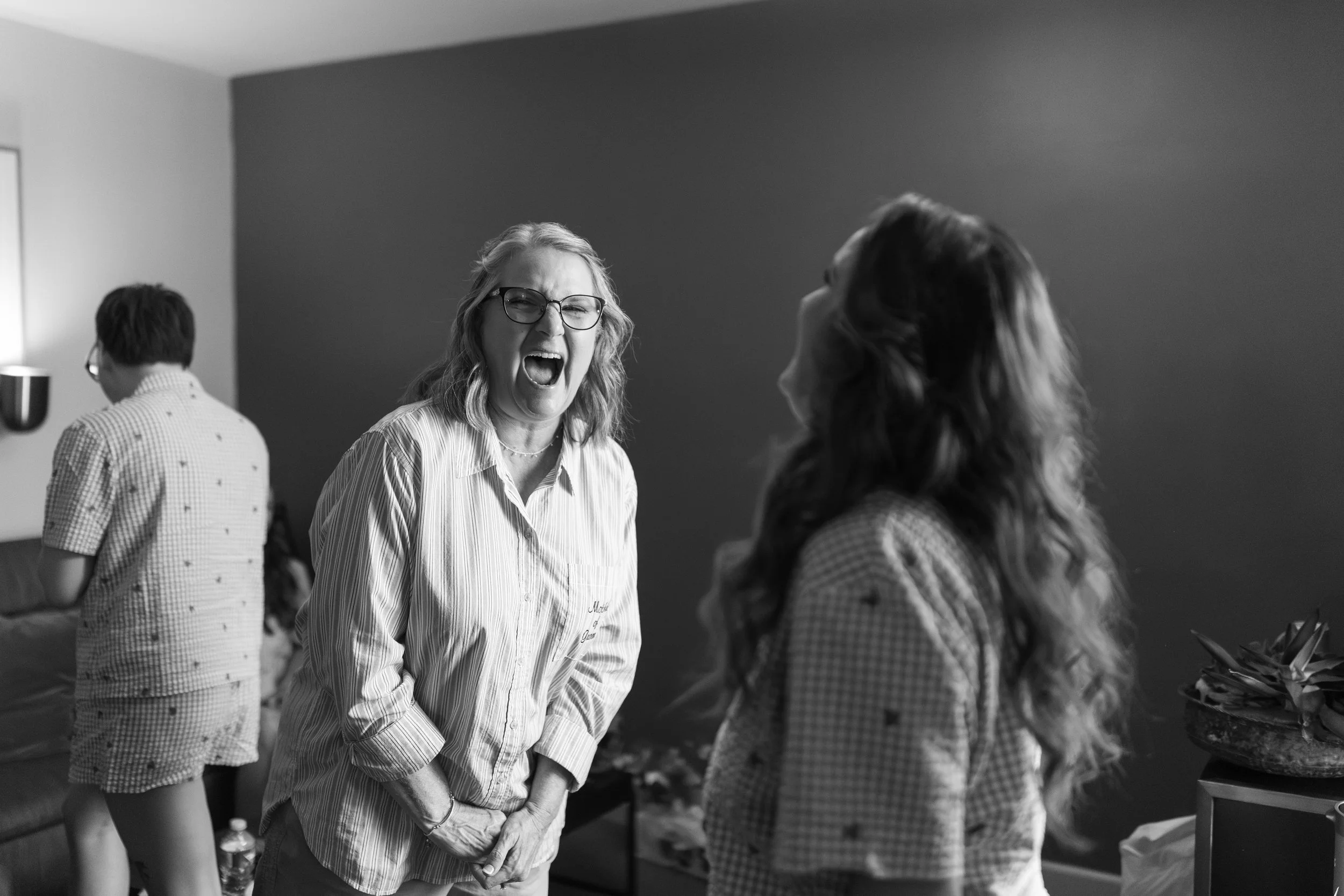 Photo of Gracie and her mother in law laughing together