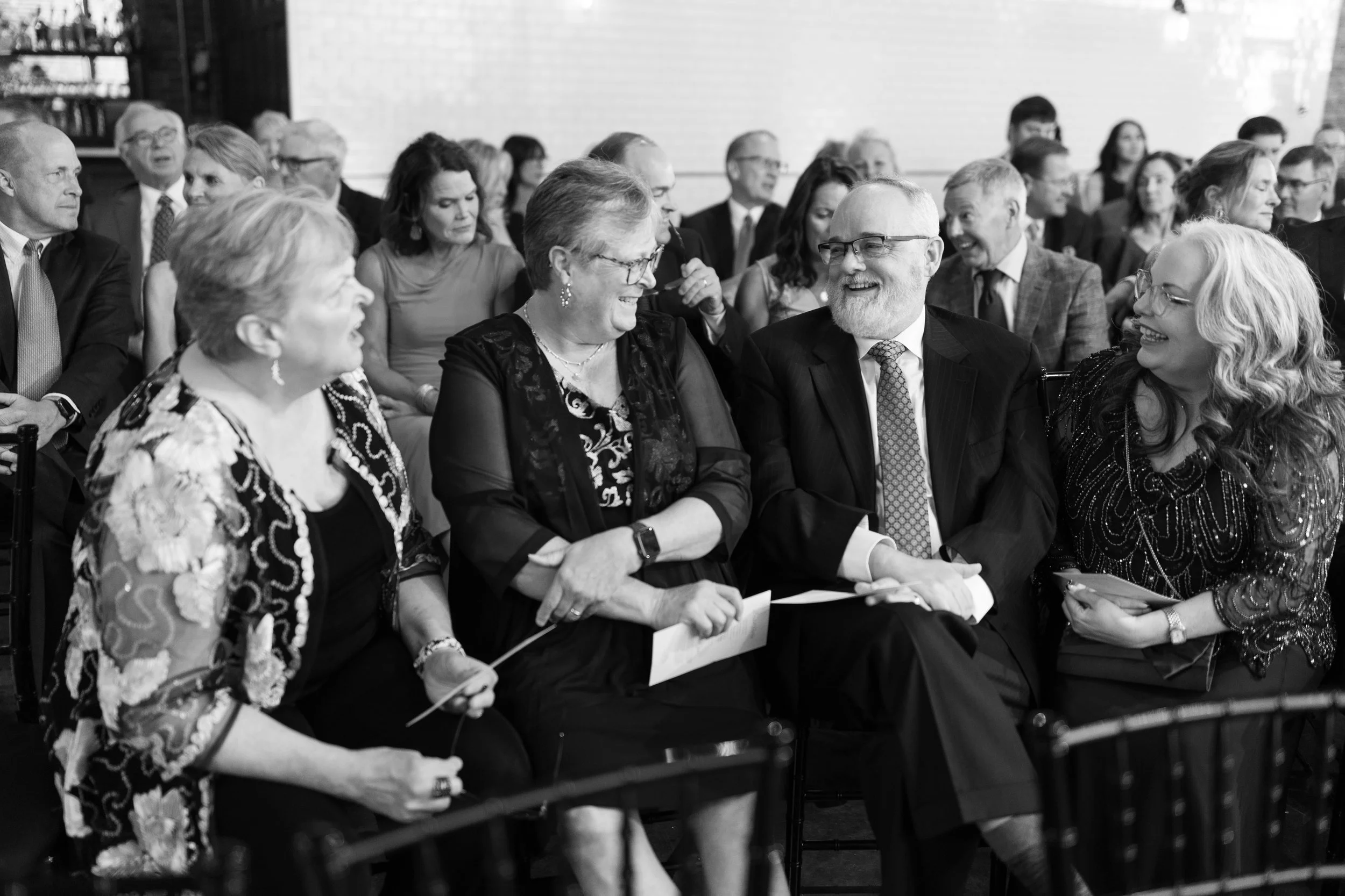 Guests talking before the ceremony