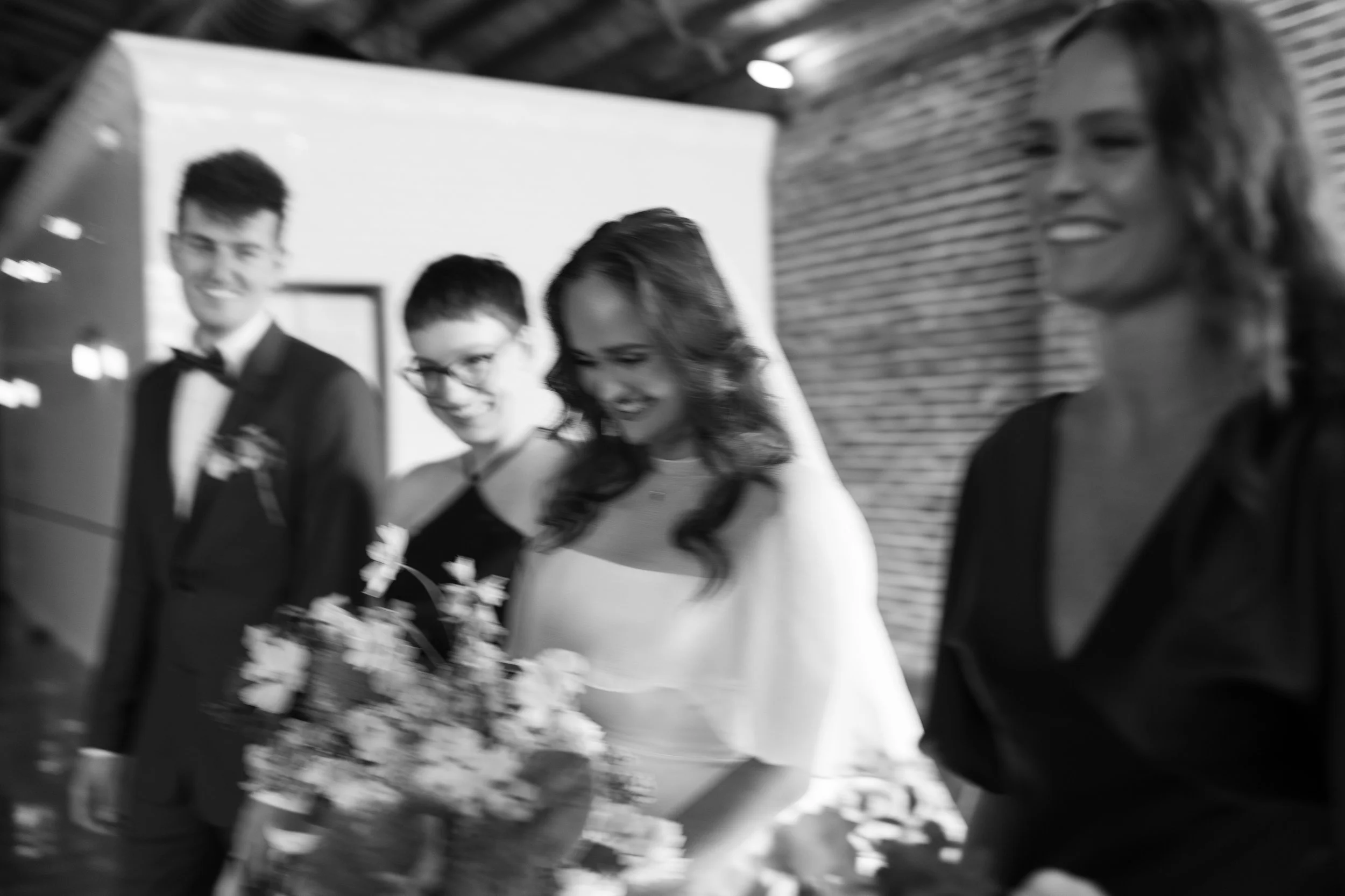 Black and white photo of the wedding party at The Guild