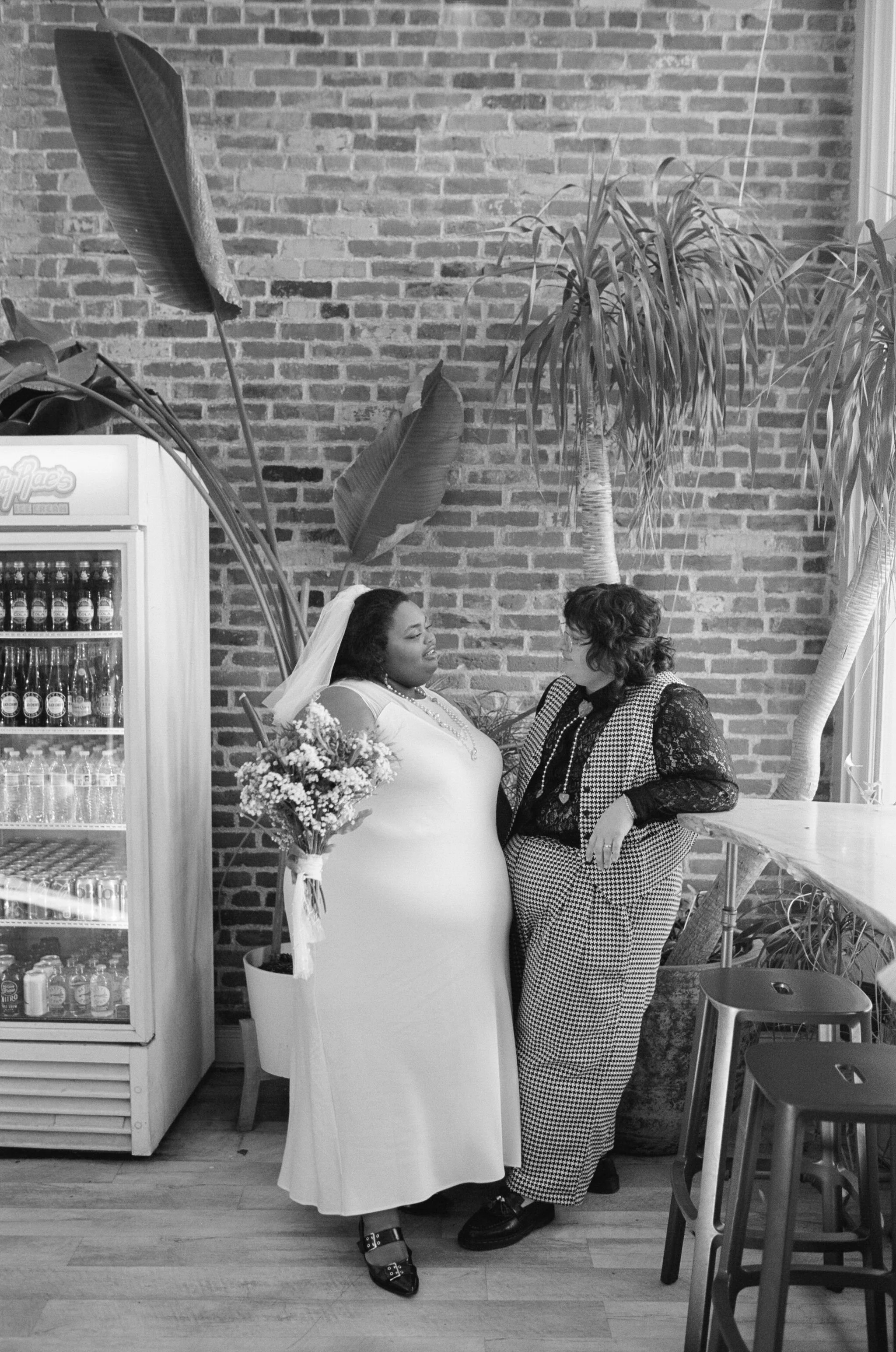 Couple taking photos at Betty Rae's 