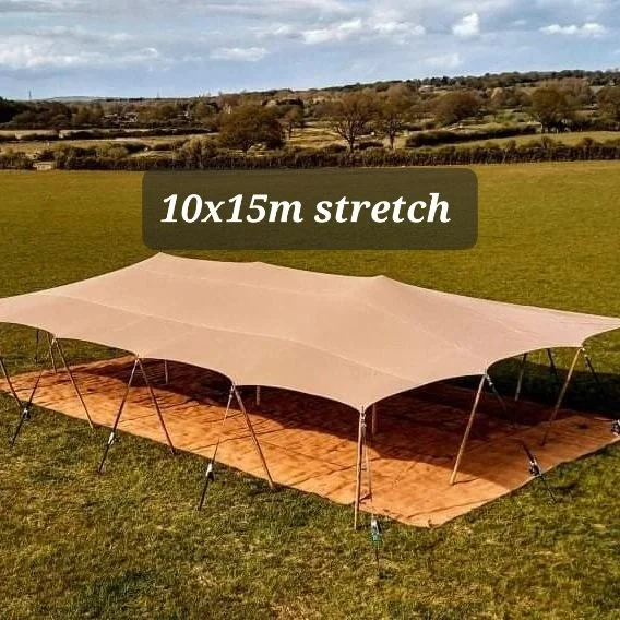 large beige 10x15 meter stretch tent - Twelve34 Productions