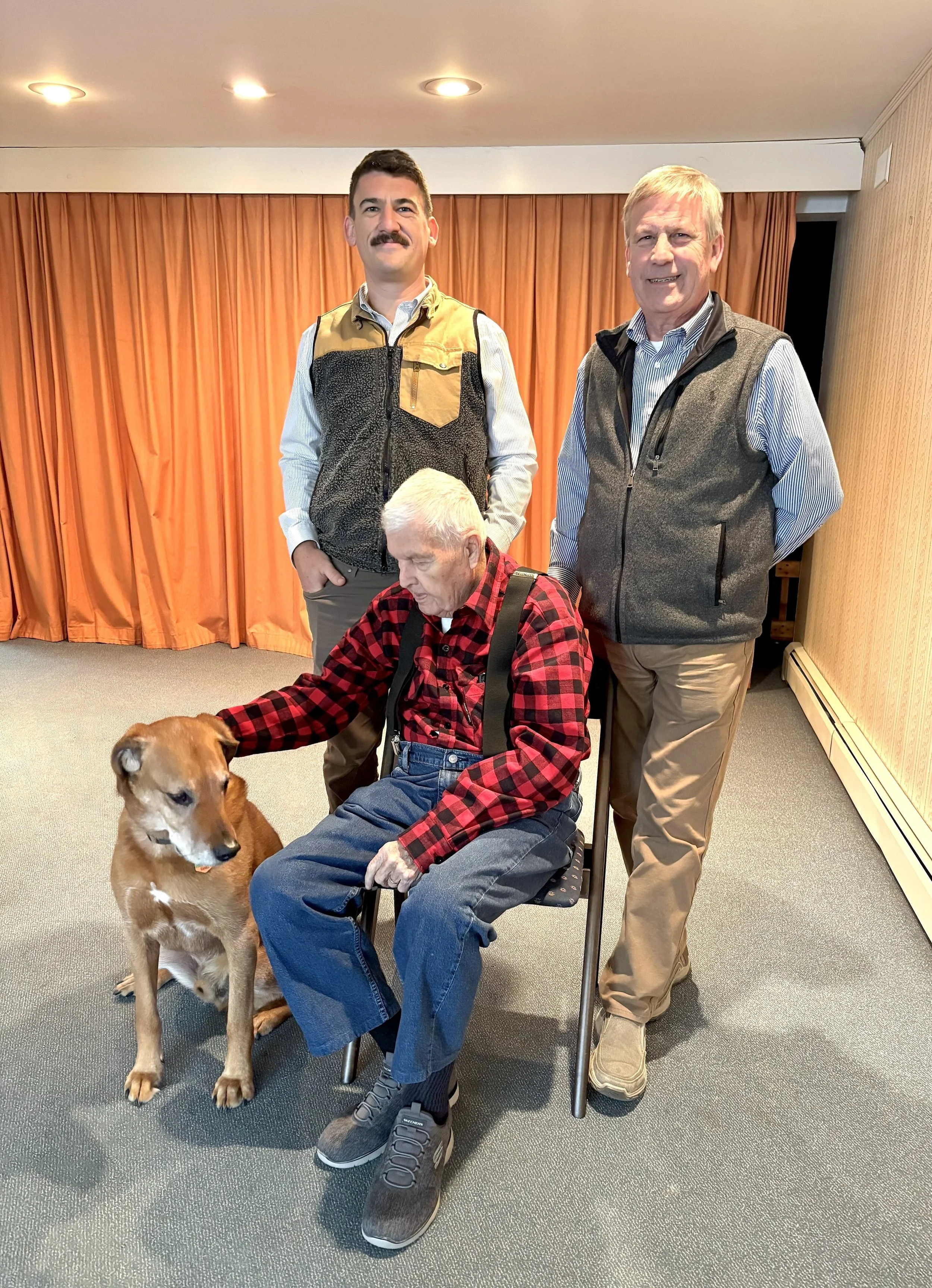 The Camps: Dwight (seated), Jordan (left), and Greg (right), with Banks, the Cabot Funeral Home's resident canine