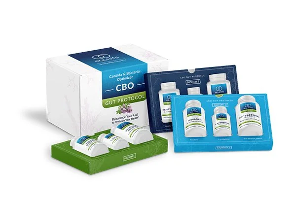 Set of dietary supplement bottles and sample packs labeled 'CBO' and 'Gut Protocol' on white background.